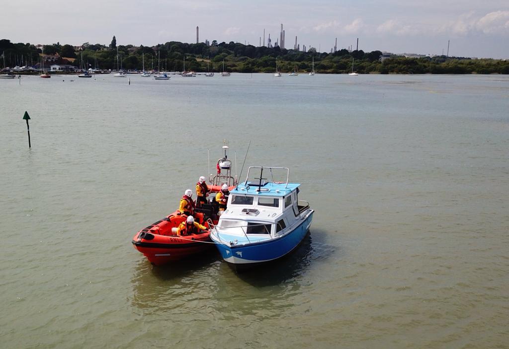 Alongside tow of casualty vessel by Calshot RNLI Atlantic 85 Lifeboat