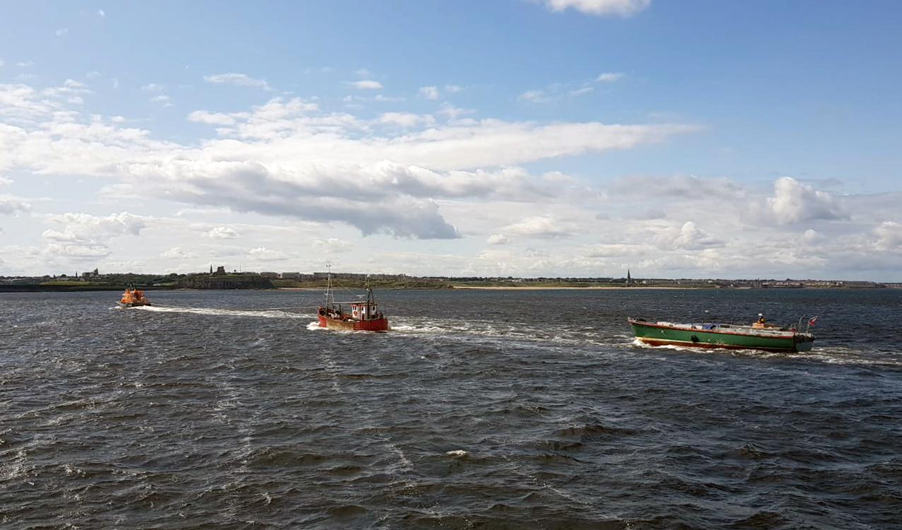 Tynemouth RNLI lifeboat station uses two Severn-class all weather lifeboats to rescue a stranded former fishing vessel and the former Royal Navy launch she was herself towing. This pic: Tynemouth RNLI lifeboat Spirit of Northumberland tows Wanderer II and MV Shearwater towards the Tyne piers.