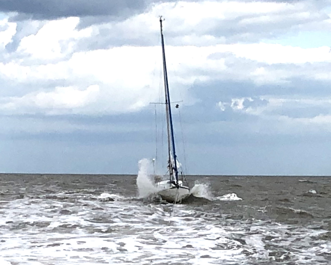 The yacht is towed to Lowestoft