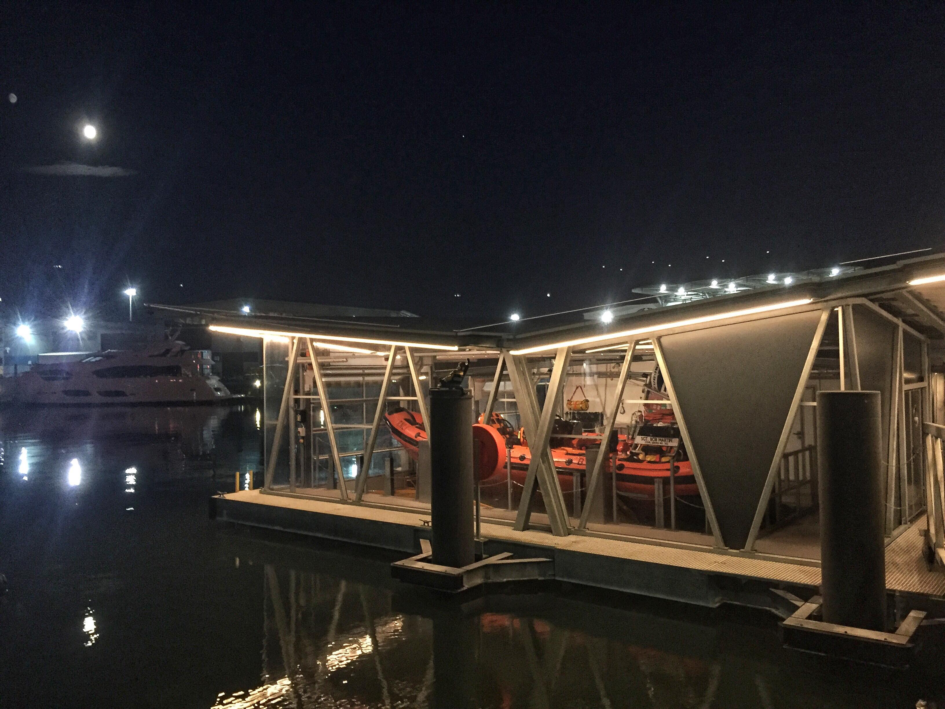 Floating boathouse at night