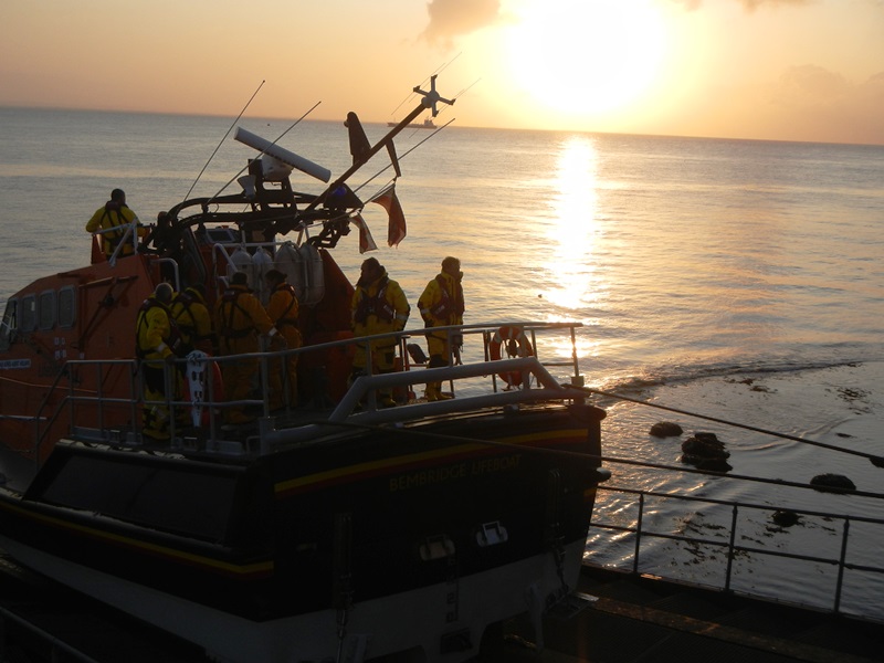 RNLB Alfred Albert Williams on the slipway silhouetted in the sun rise