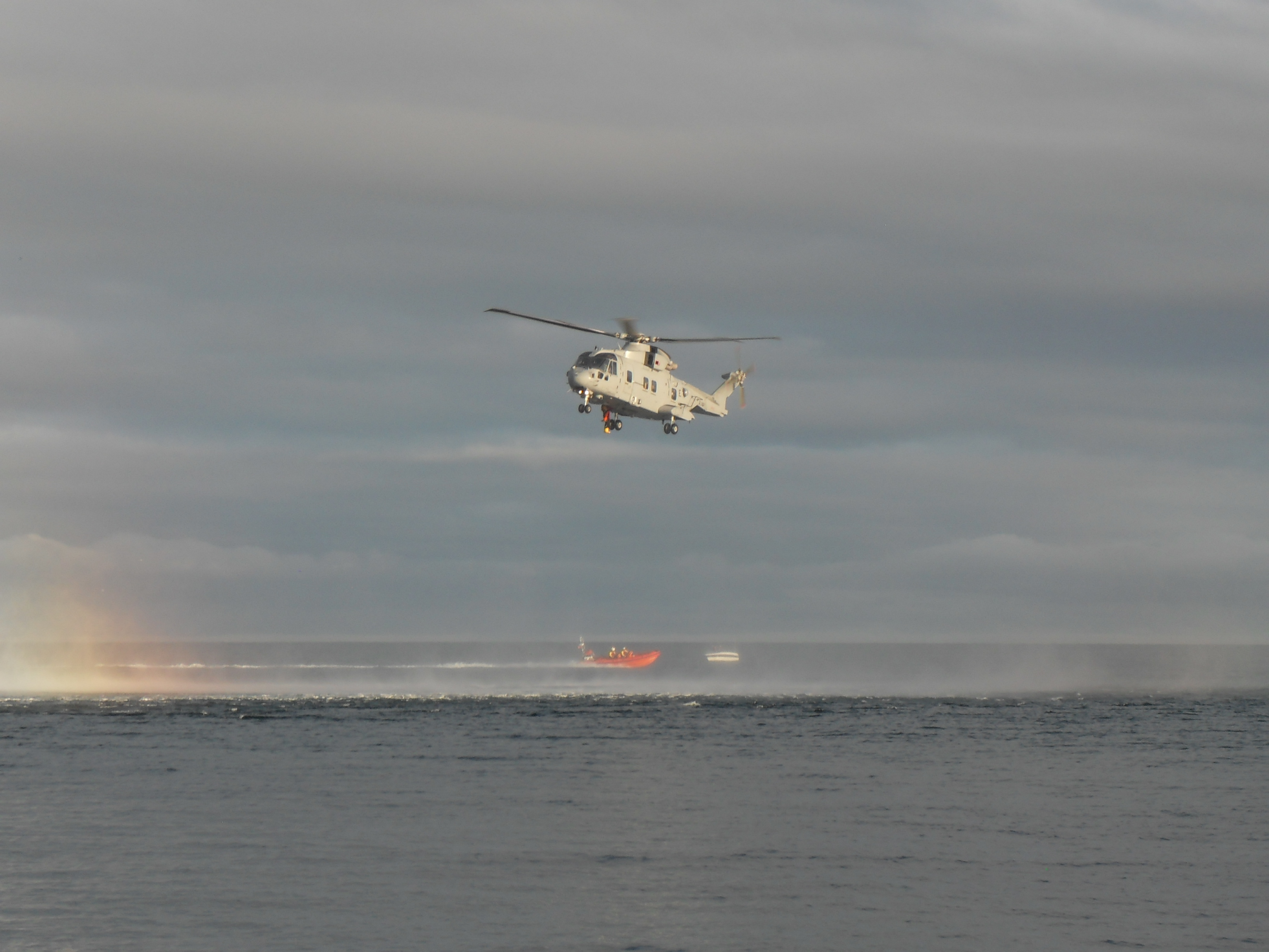 Teignmouth RNLI lifeboat training with Merlin helicopter