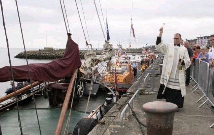Fr Cullen blessing of the boats