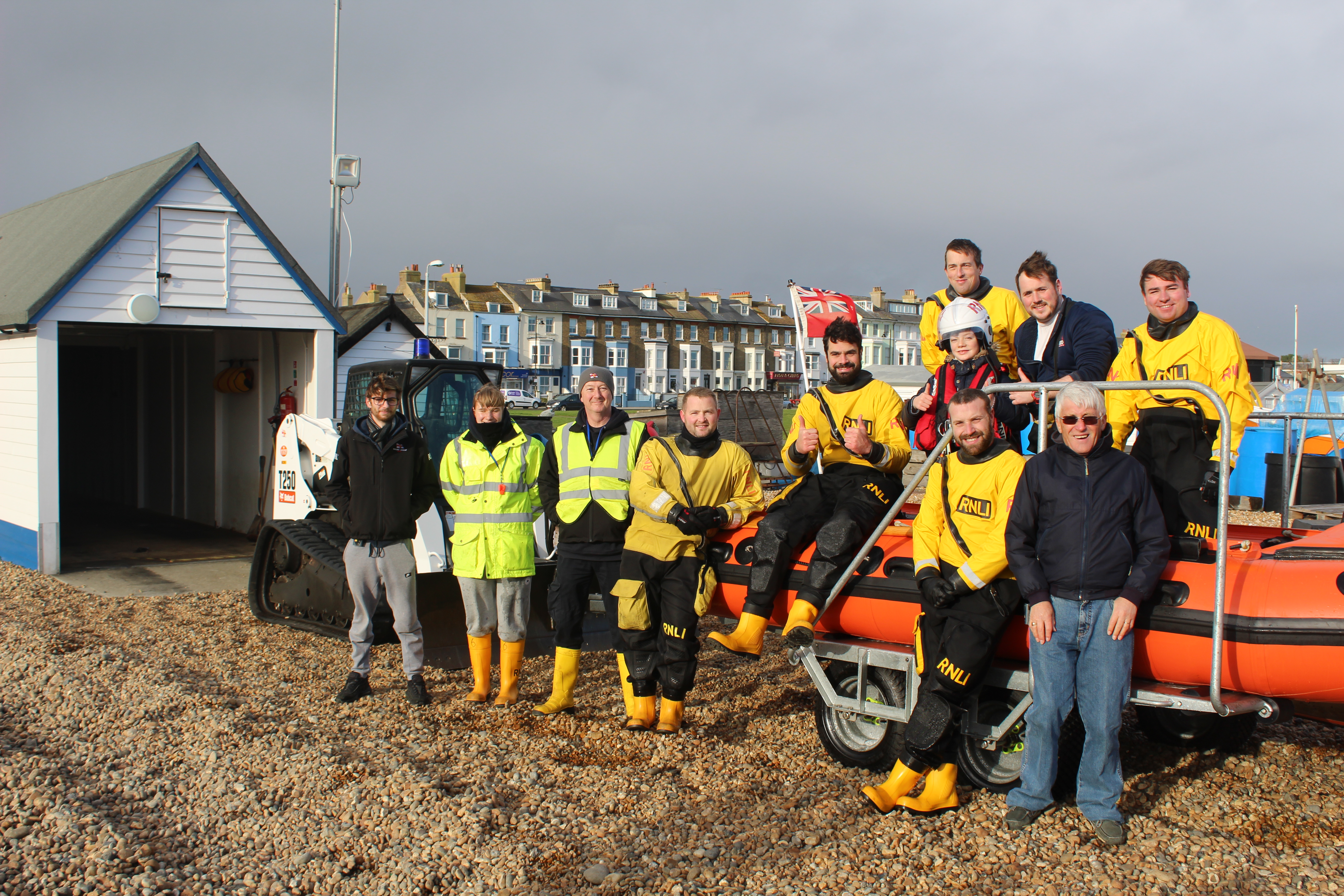 Walmer volunteers with young supporter Felix Flanagan.