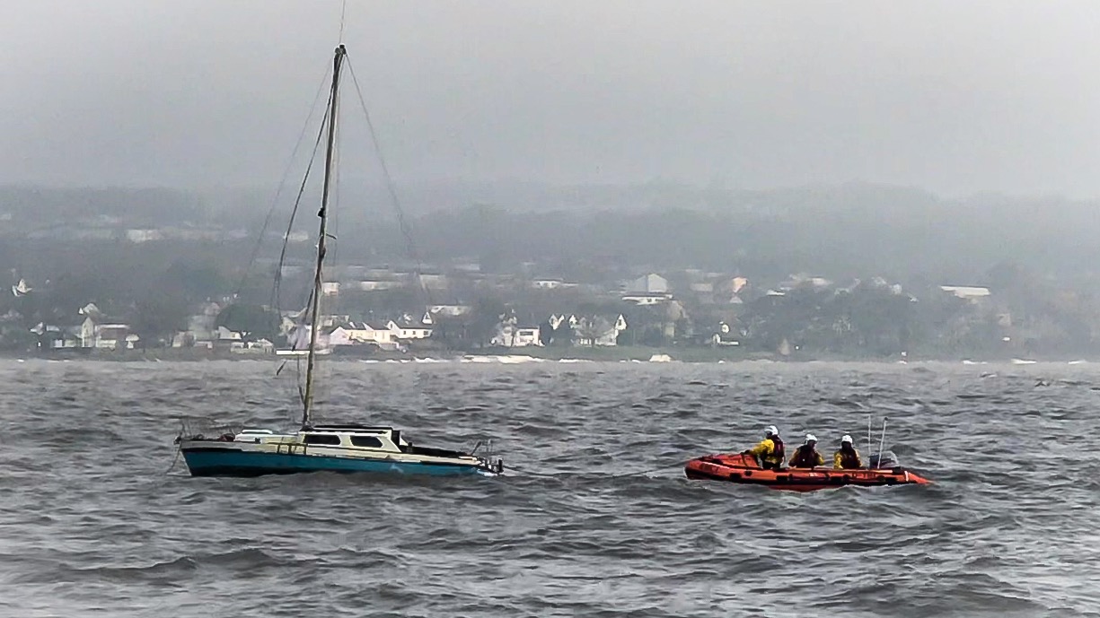 Crew take the 7 metre yacht in tow