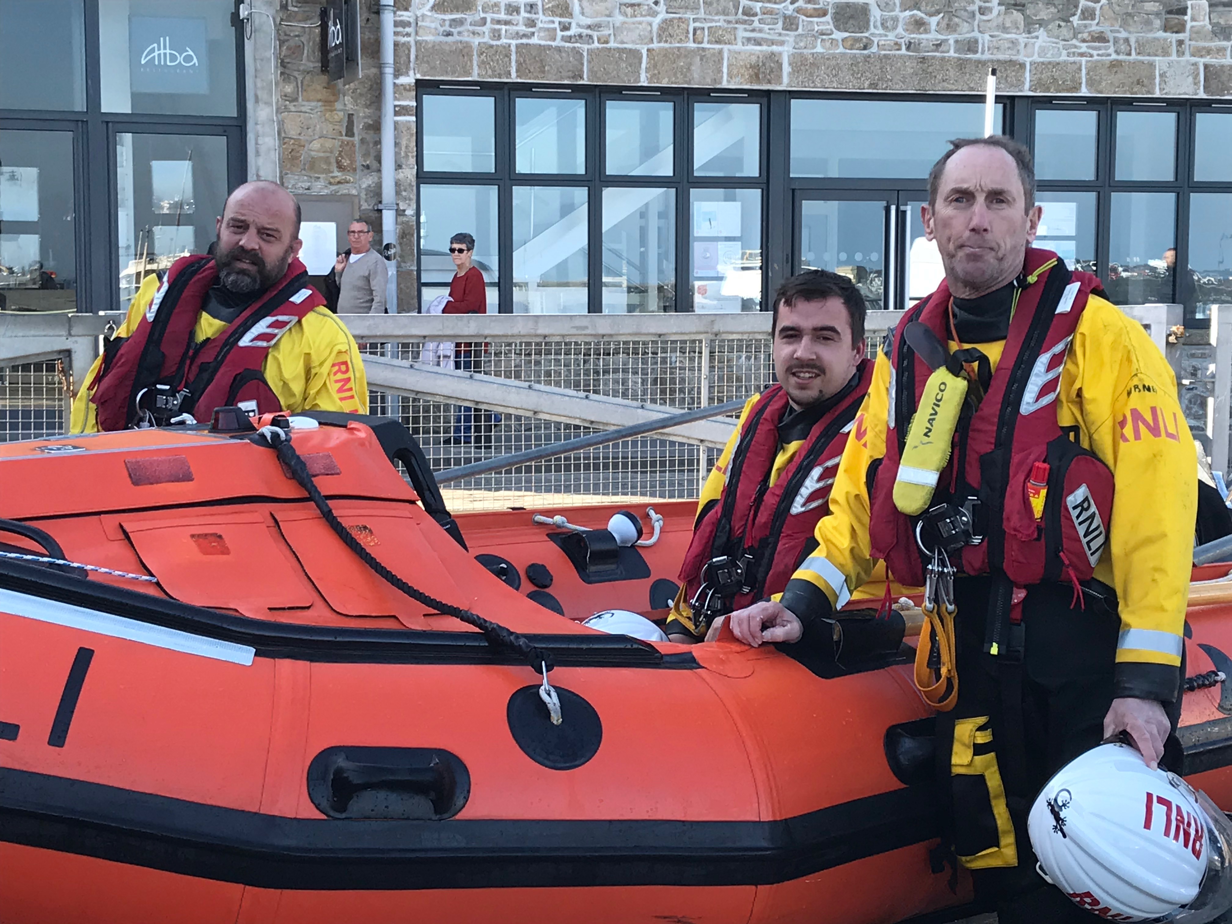 Crew pictured around the boat 