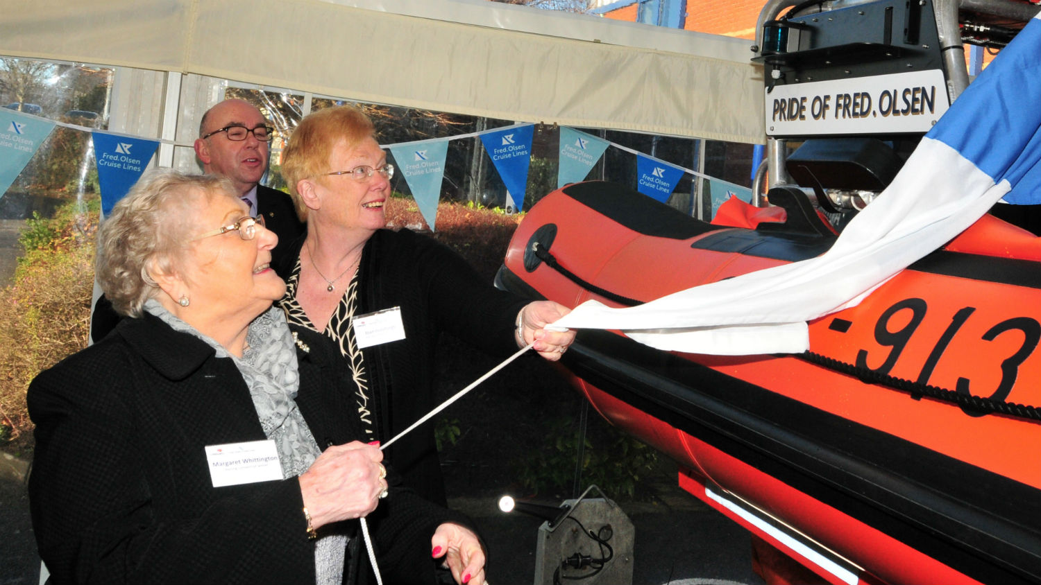 The winners of Fred. Olsen Cruise Line's naming competition - Margaret Manning (Left), Joan Hutchings and Peter Ruck unveil the 'Pride of Fred. Olsen'