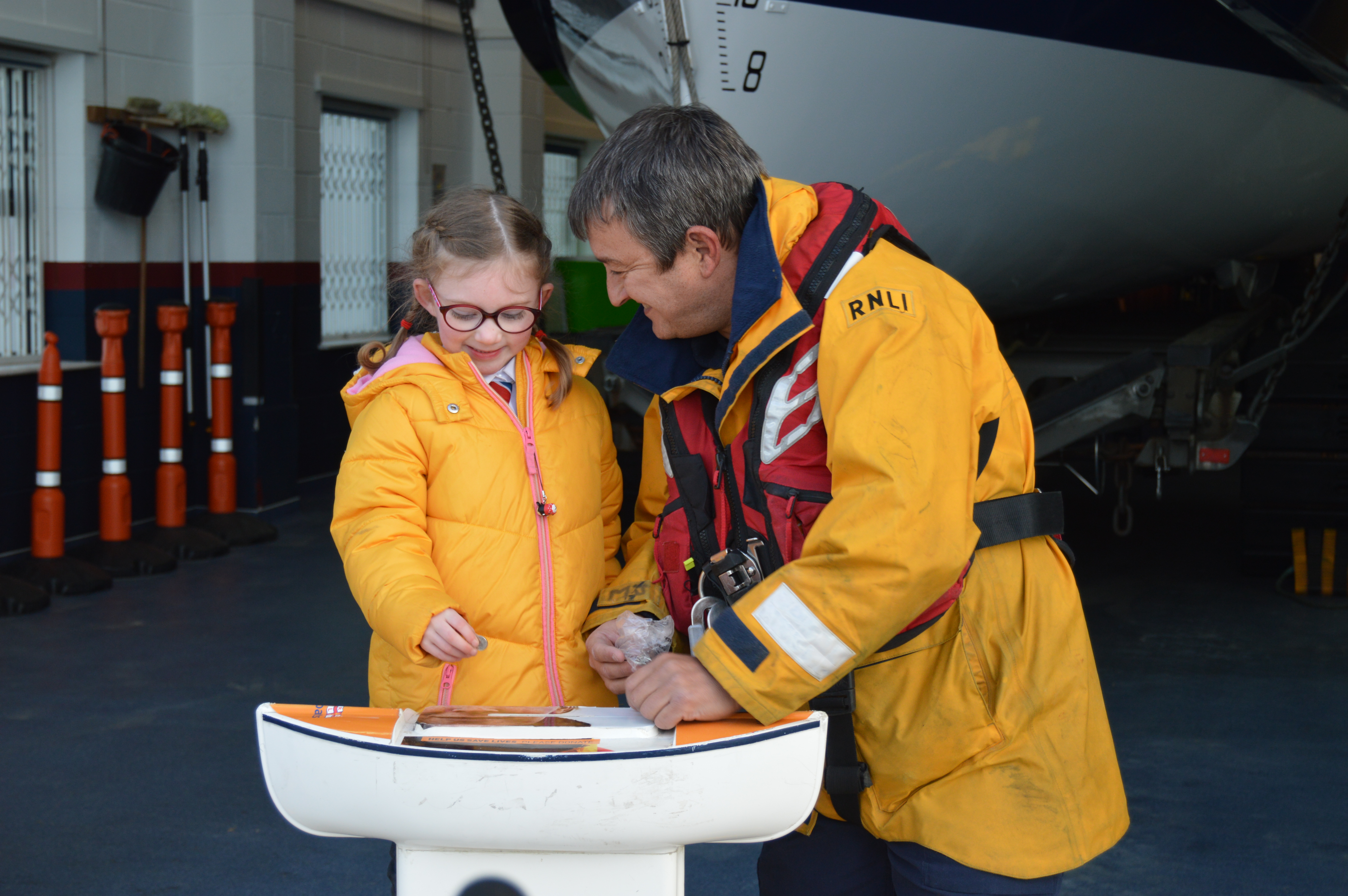 Darcey Payne with Rhyl RNLI Coxswain Martin Jones