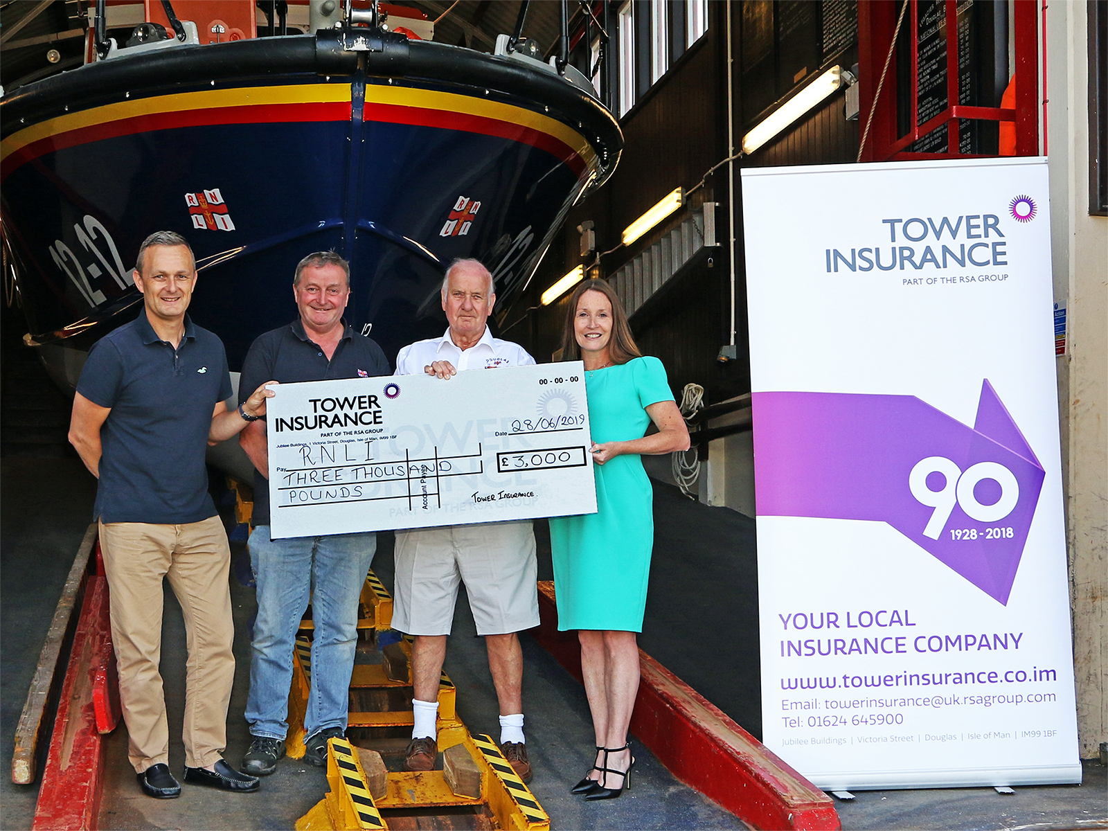 Cheque presentation L-R: Mr Richard Hulme (Tower Ins.), Mr Tony Radcliffe(RNLI), Mr Peter Cain(RNLI) and Ms Kellie Hands(Tower Ins.)
