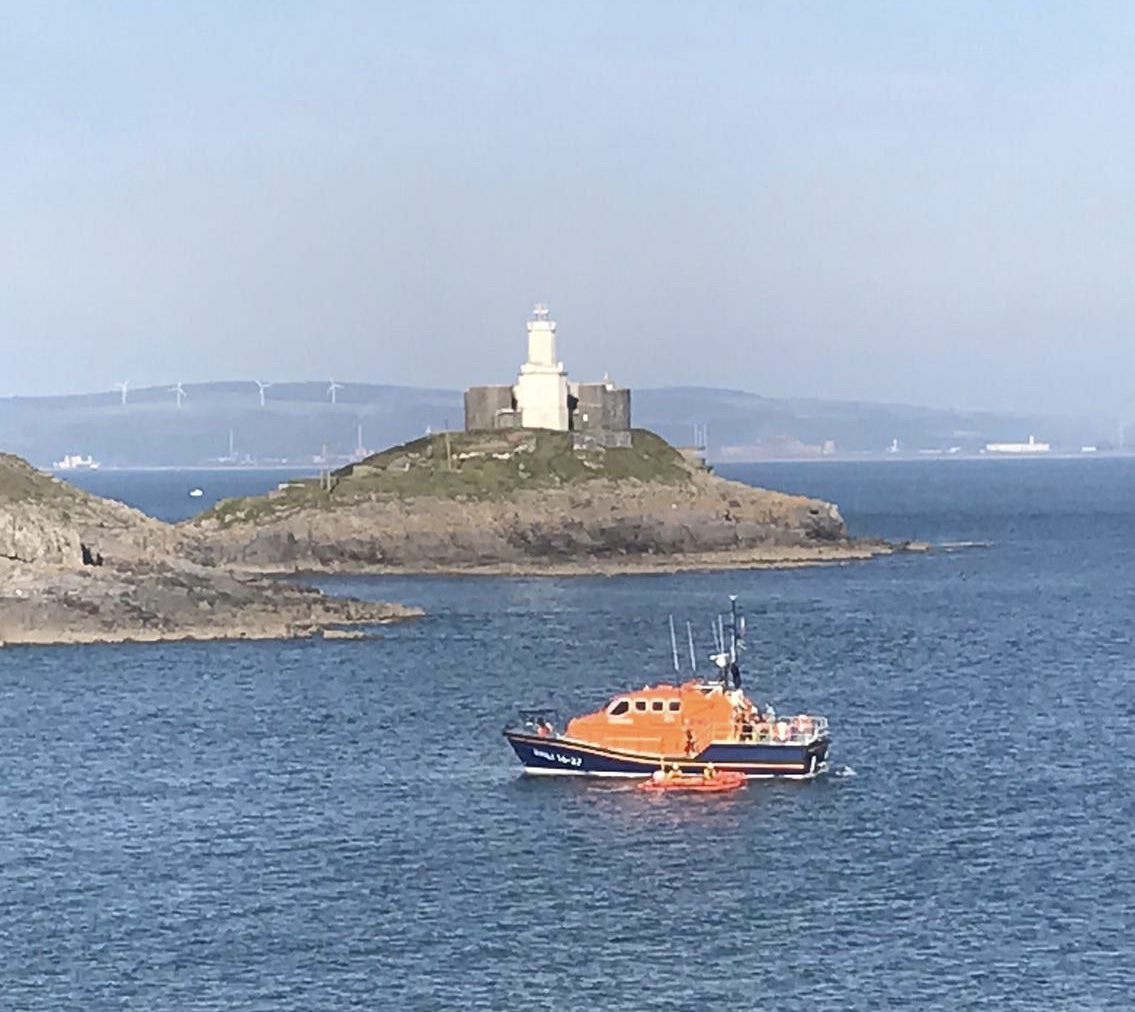 Inshore and all weather lifeboats assist swimmer at Bracelet Bay