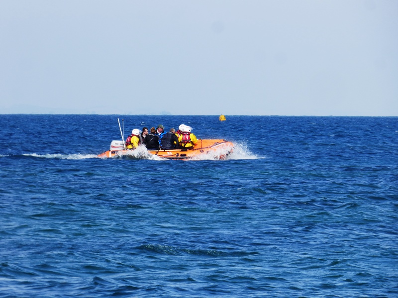 Some of the crew being taken back to their yacht in RNLB Norman Harvey