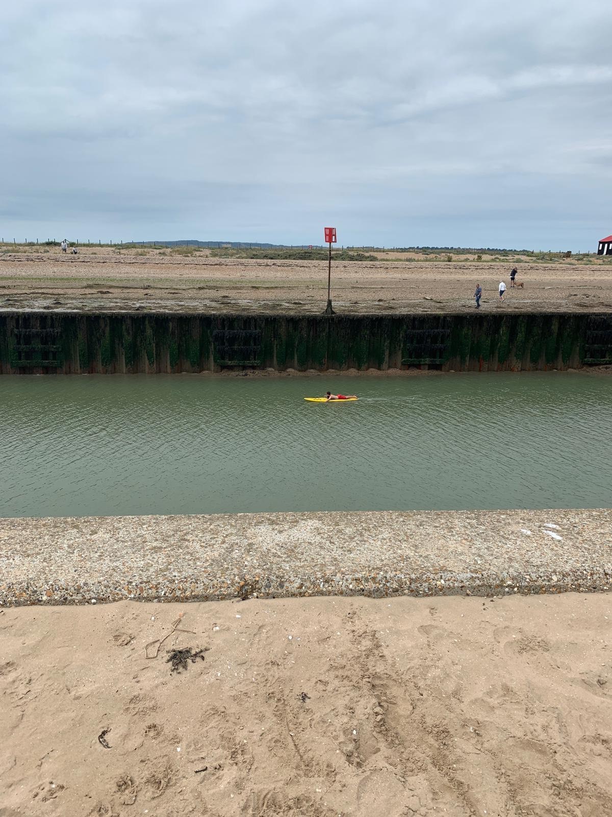 RNLI Lifeguard Laurence Petit mid-rescue yesterday