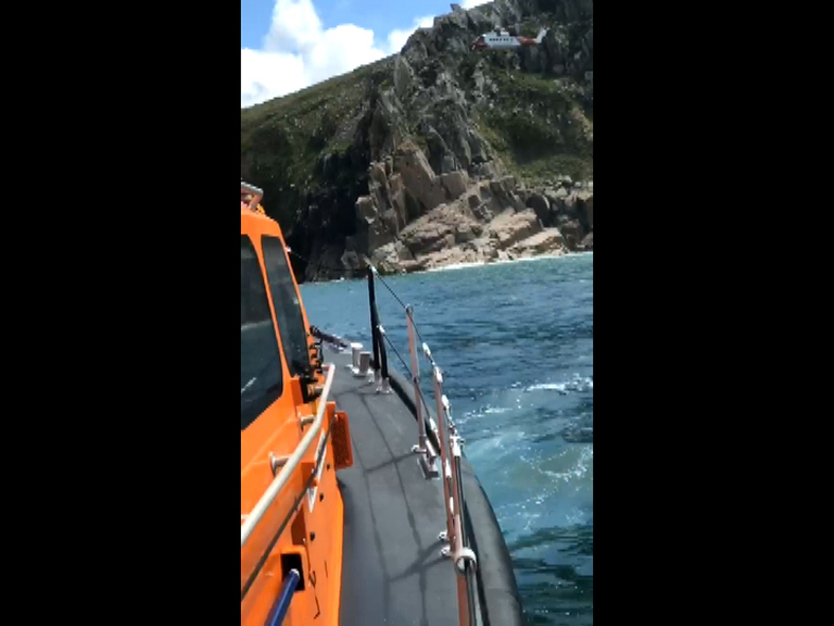 Both St Ives RNLI all-weather and inshore lifeboats launched at request of Falmouth Coastguard to reports of a climber who had fallen into the sea and required assistance at Commando Ridge.
