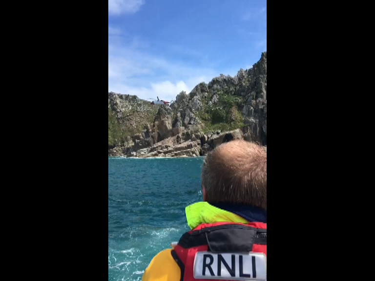 Both St Ives RNLI all-weather and inshore lifeboats launched at request of Falmouth Coastguard to reports of a climber who had fallen into the sea and required assistance at Commando Ridge.