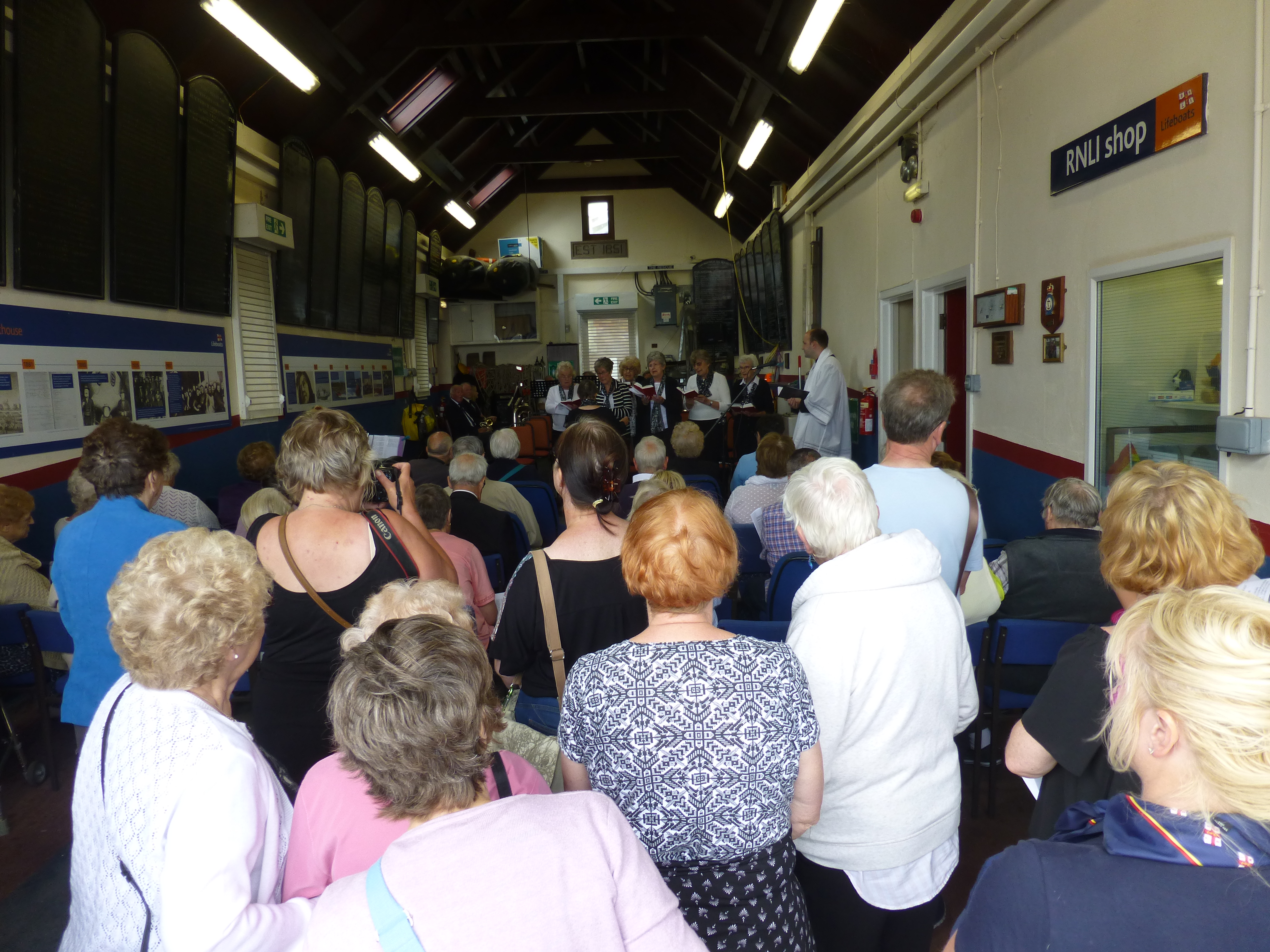 The boathouse filled with supporters