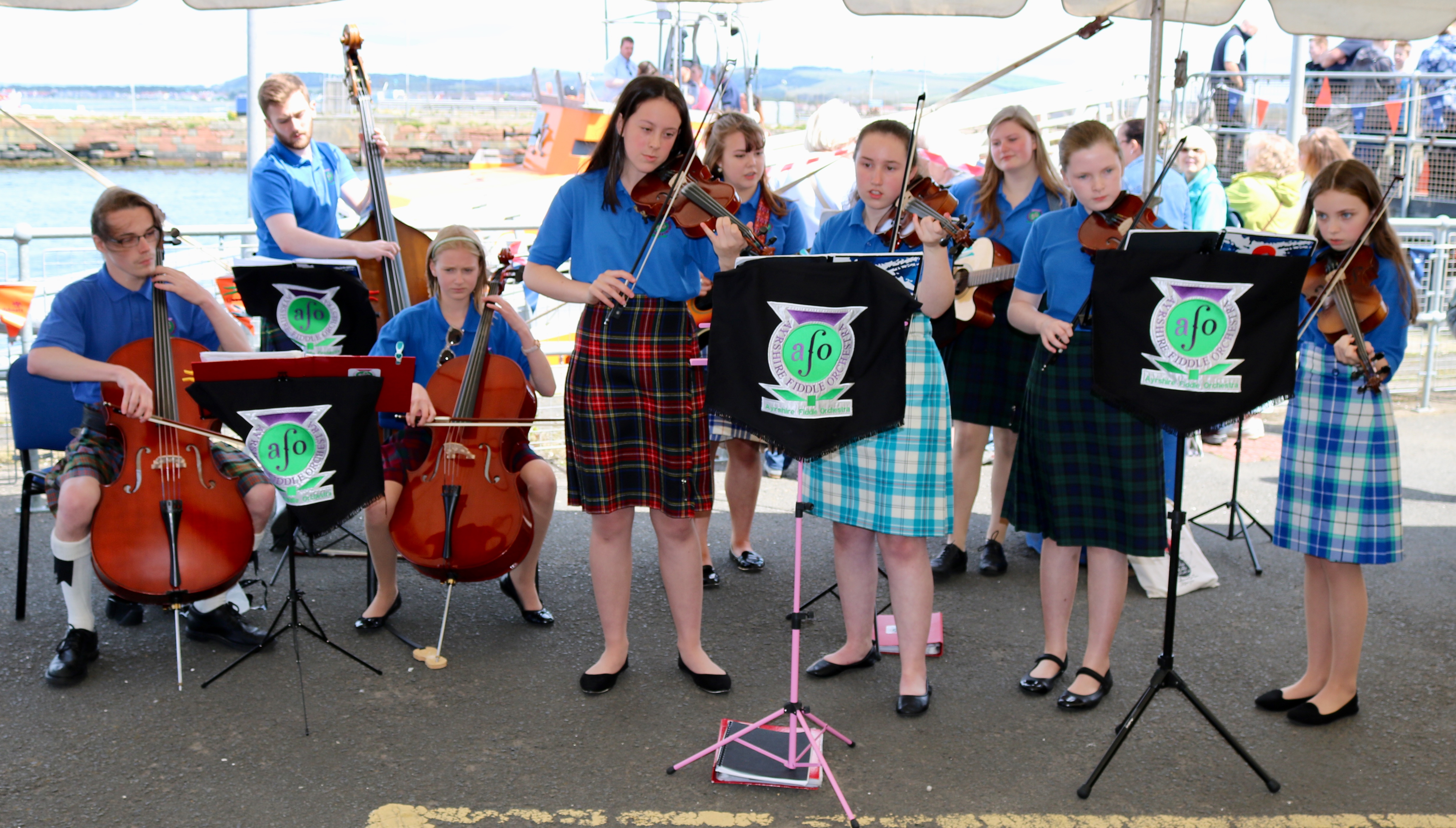 Members of the Ayrshire Fiddle Orchestra entertaining the crowd
