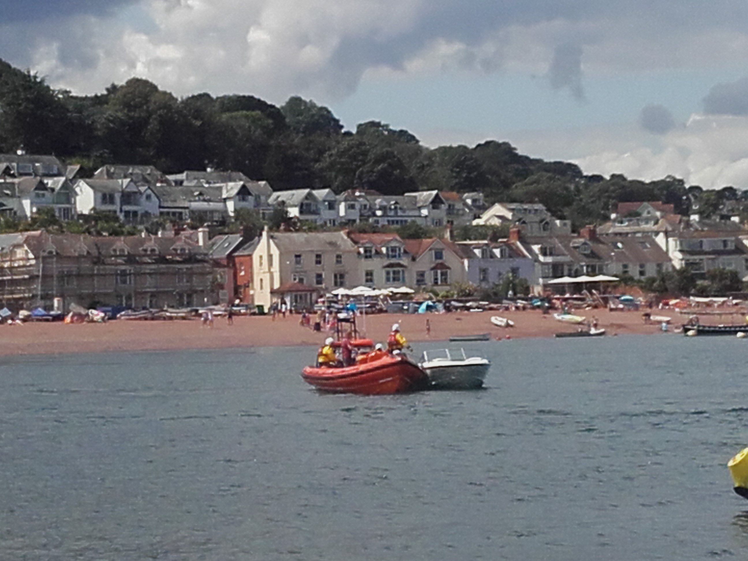 Teignmouth RNLI lifeboat crew return Bayliner boat to Teignmouth