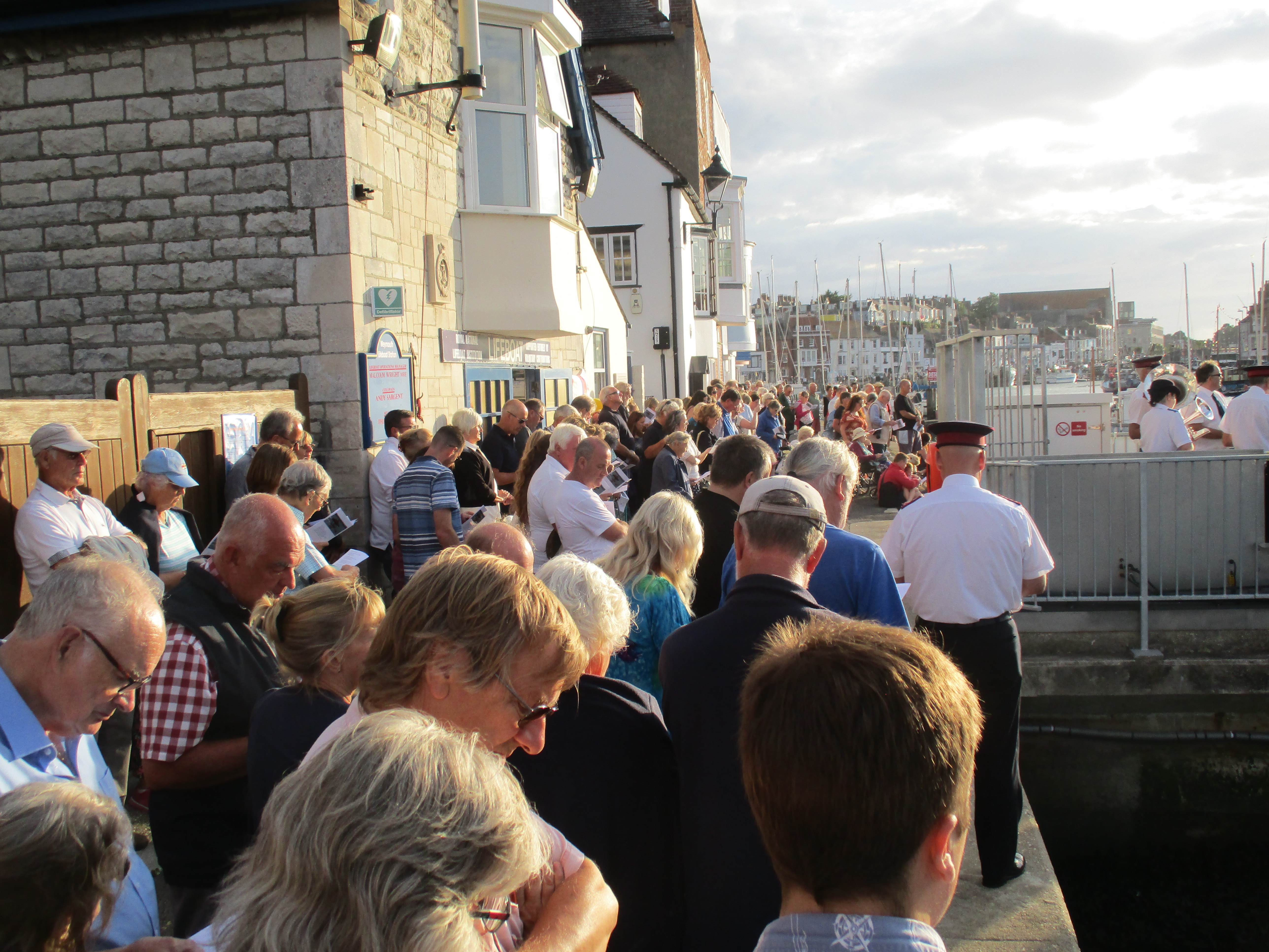 The crowd on the quayside