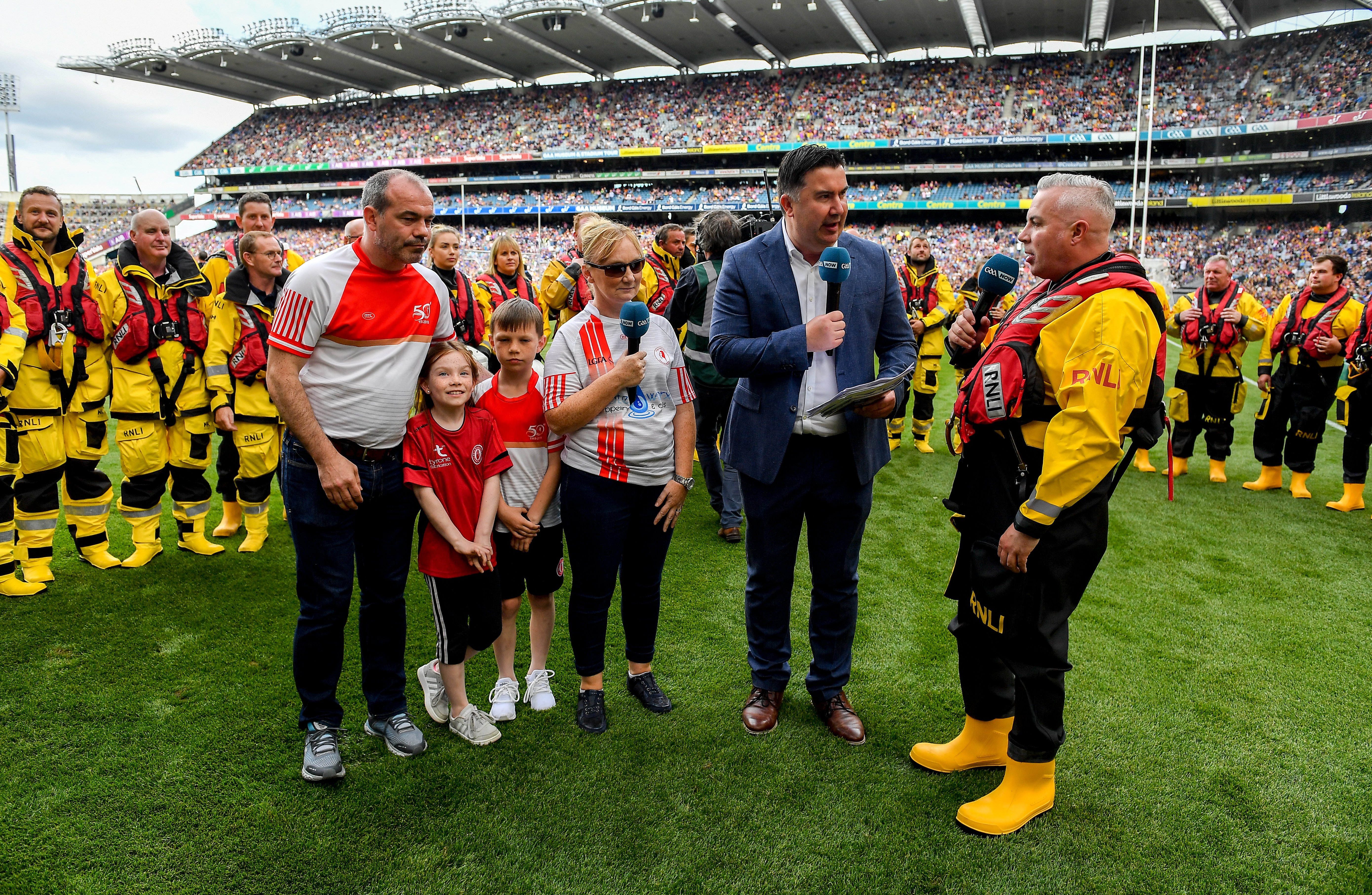 The McCallion Family and Shane Smyth from Bundoran RNLI on the pitch of Croke Park for their interview