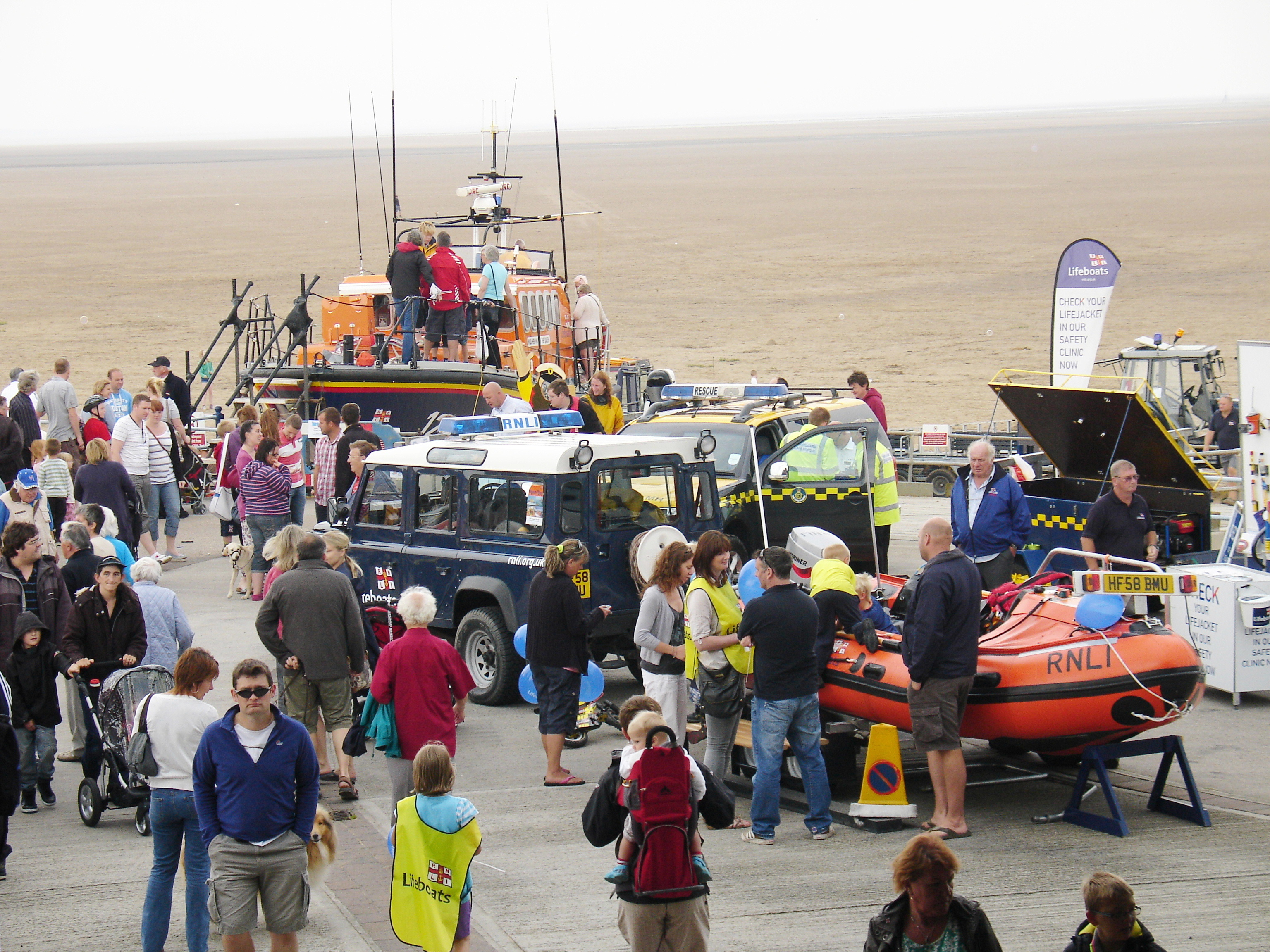 crowds gather round the lifeboats on Family Fun Day