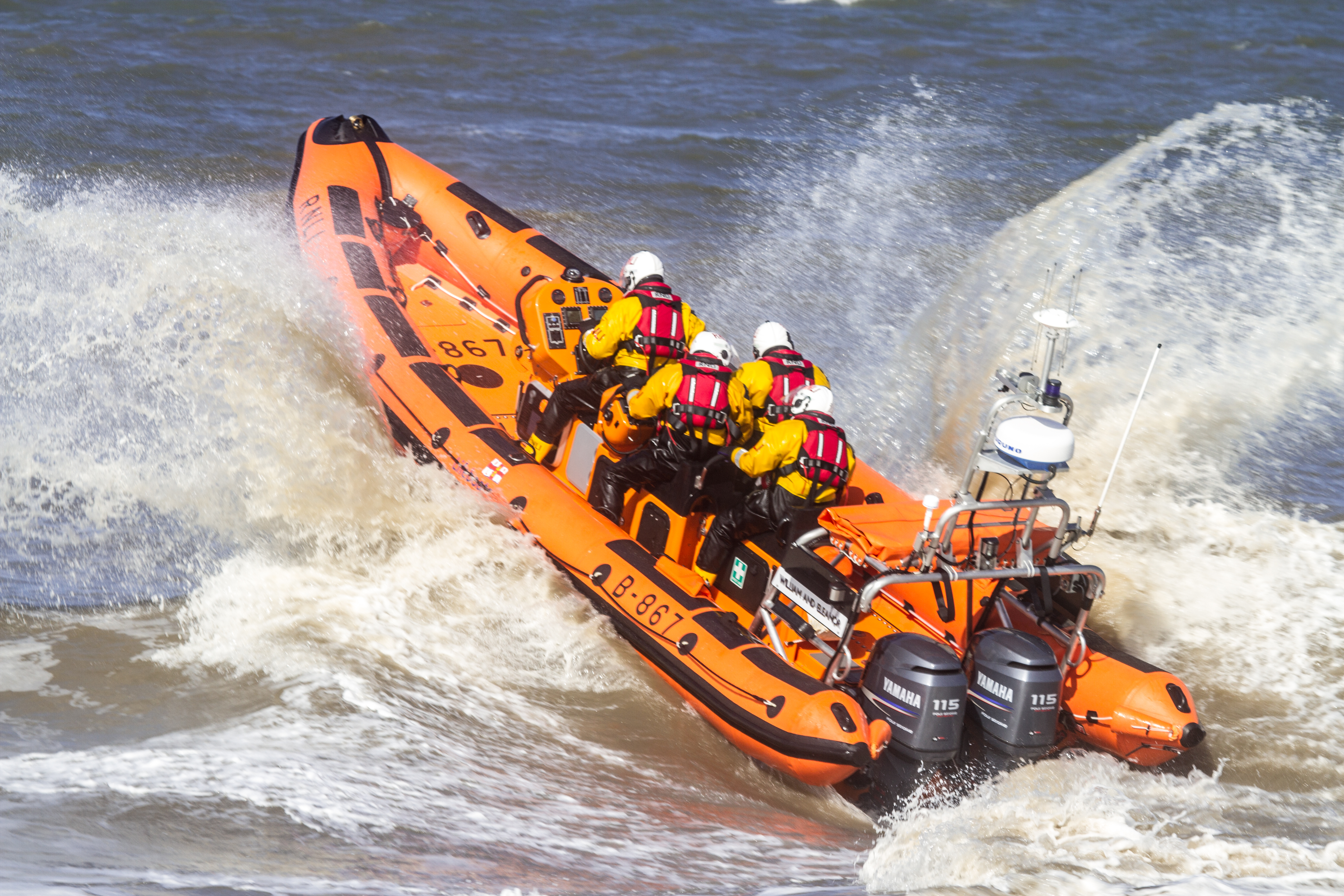 Blackpool RNLI Atlantic 85 lifeboat launching in surf