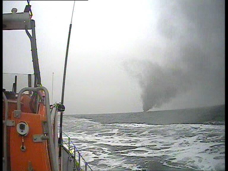Photo from the lifeboat looking ahead at the fire