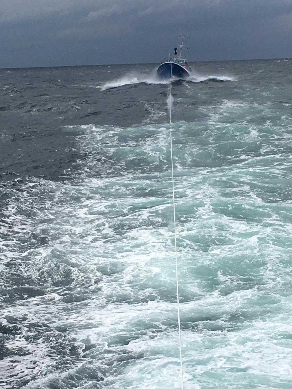 Vessel under tow in rough seas