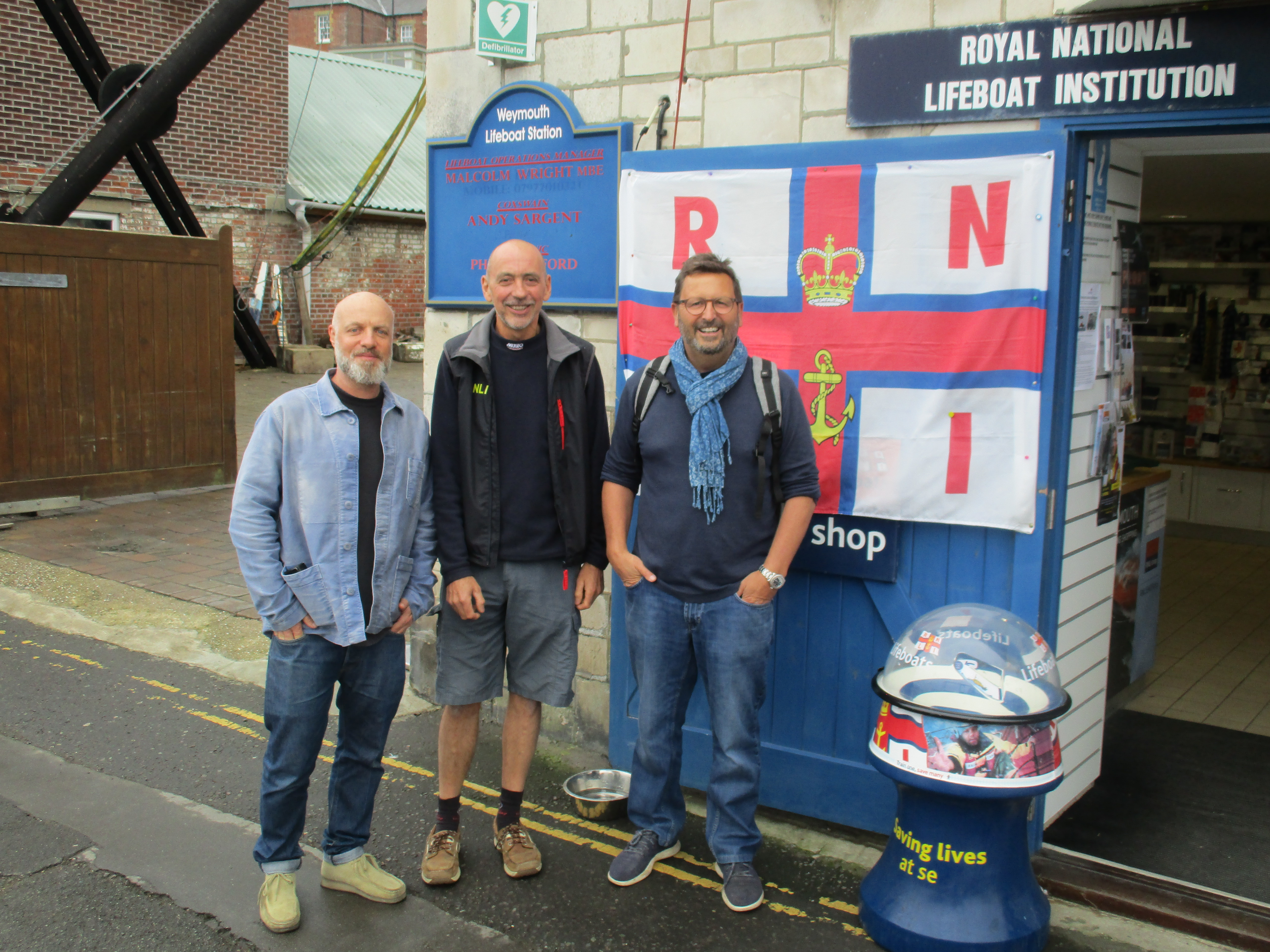 Dave Strauss, Andy Sargent and Mitch Tonks outside Weymouth lifeboat station