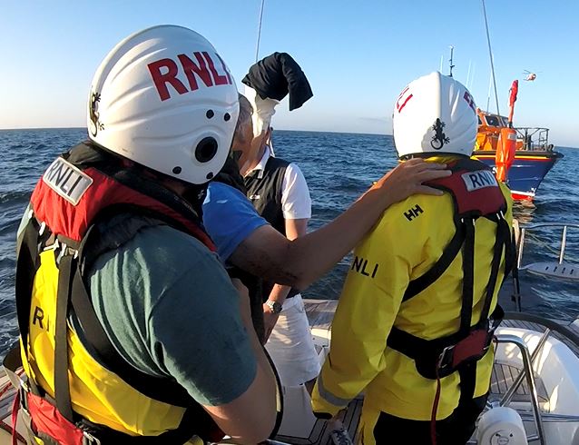 Casualty preparing for transfer to lifeboat