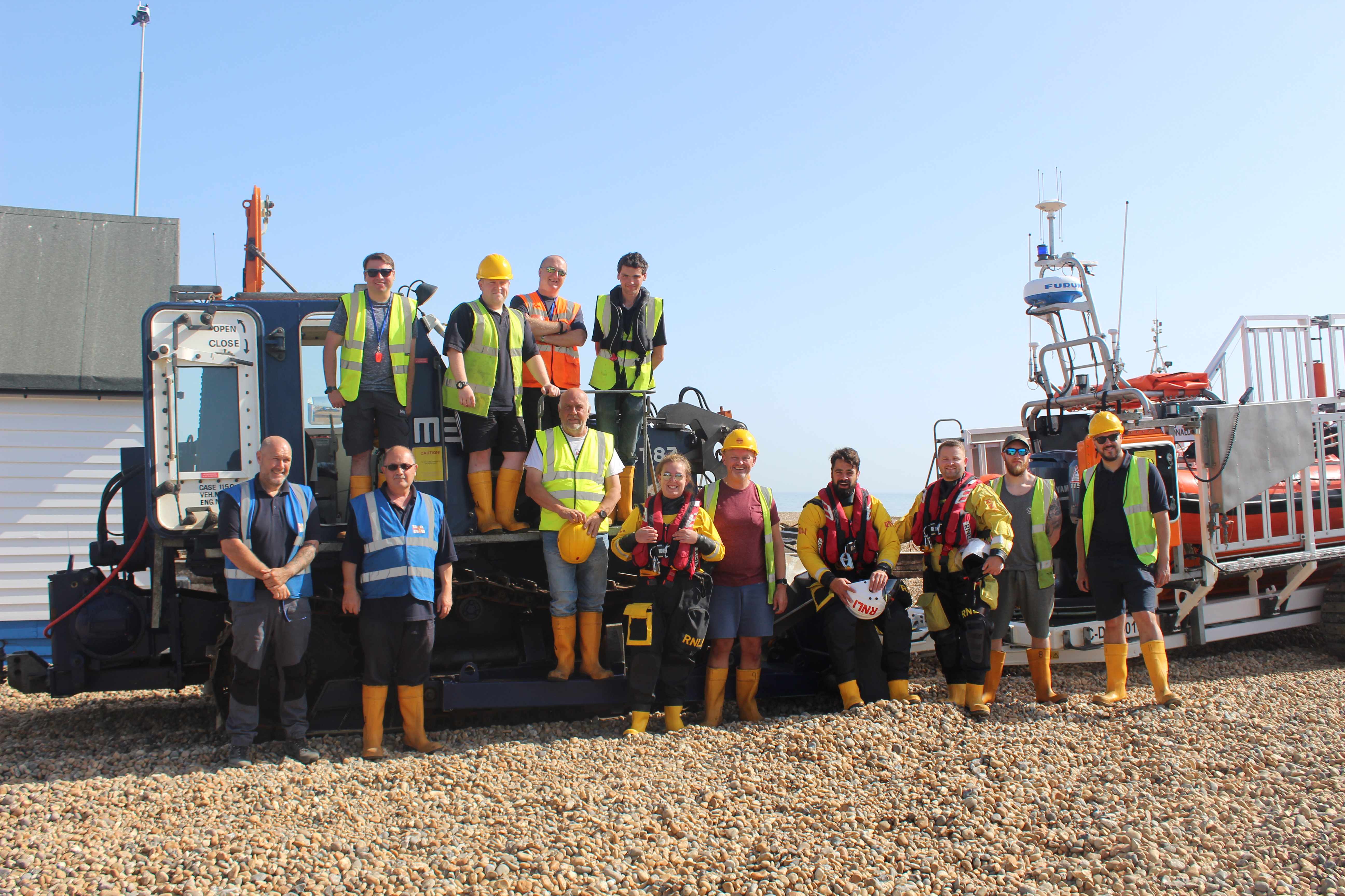 Walmer crew and trainers bid farewell to the Case tractor.