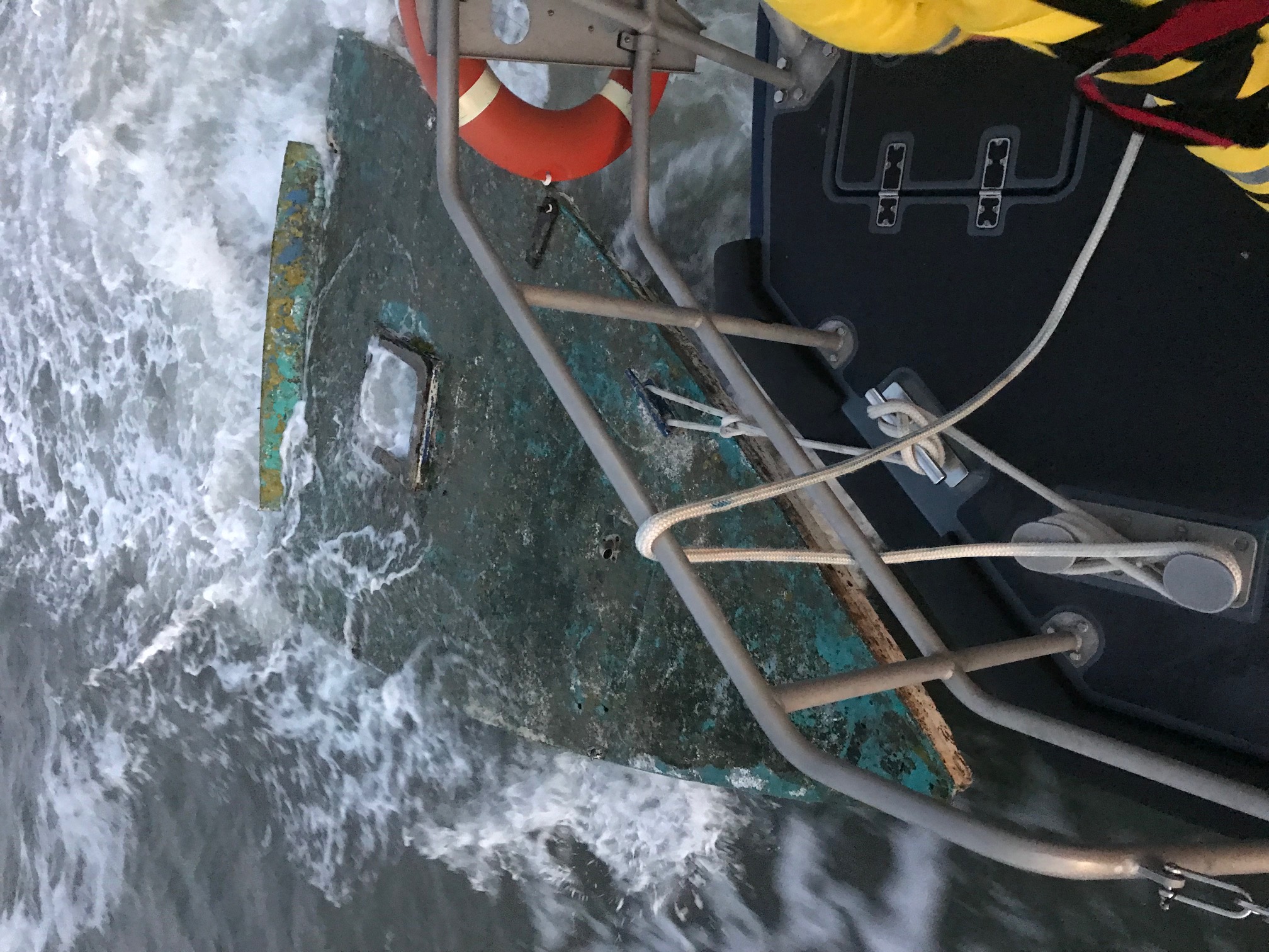 Bow of boat being towed from stern of Shannon class lifeboat