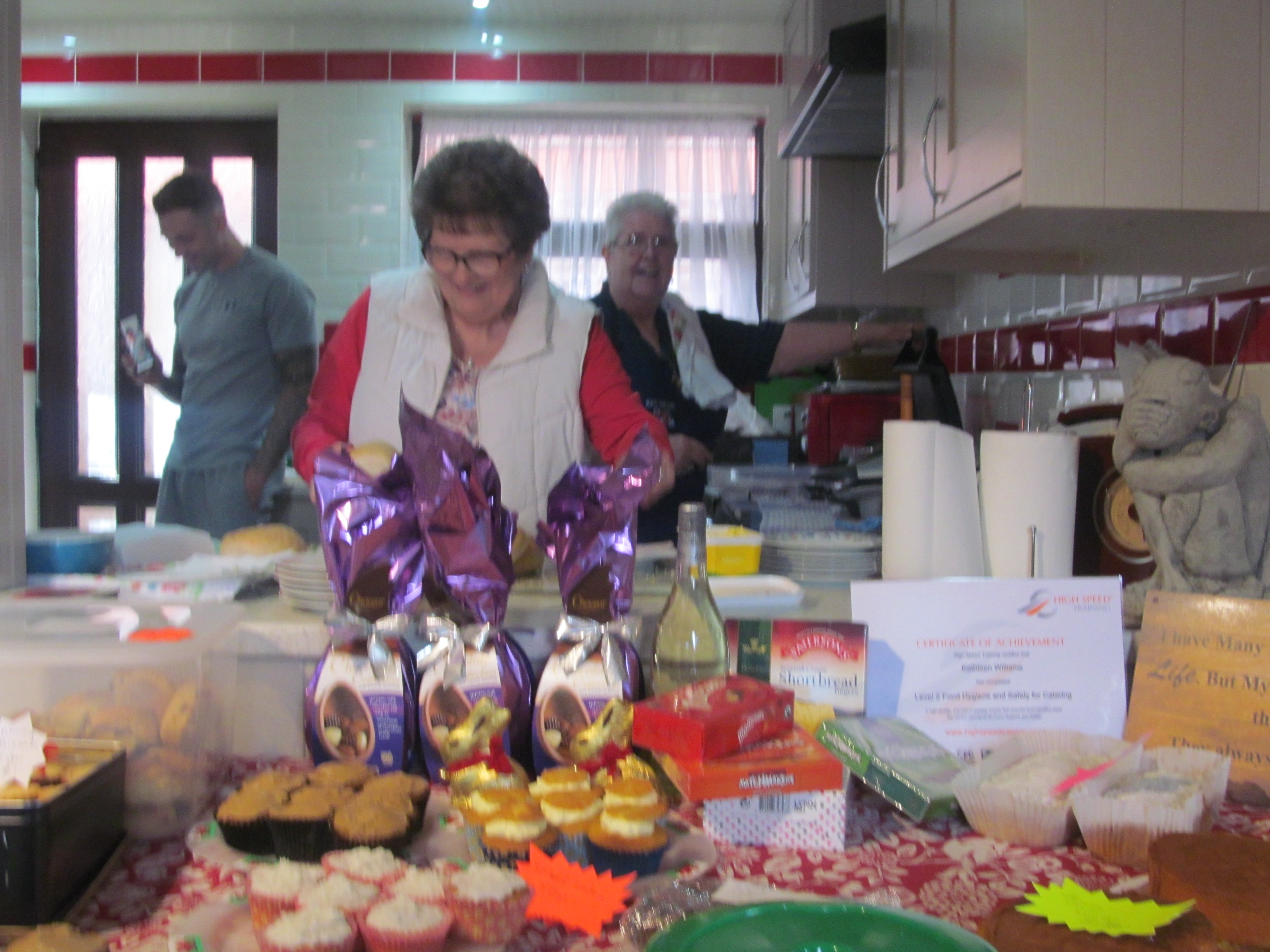 Kath and Ann busy in the kitchen