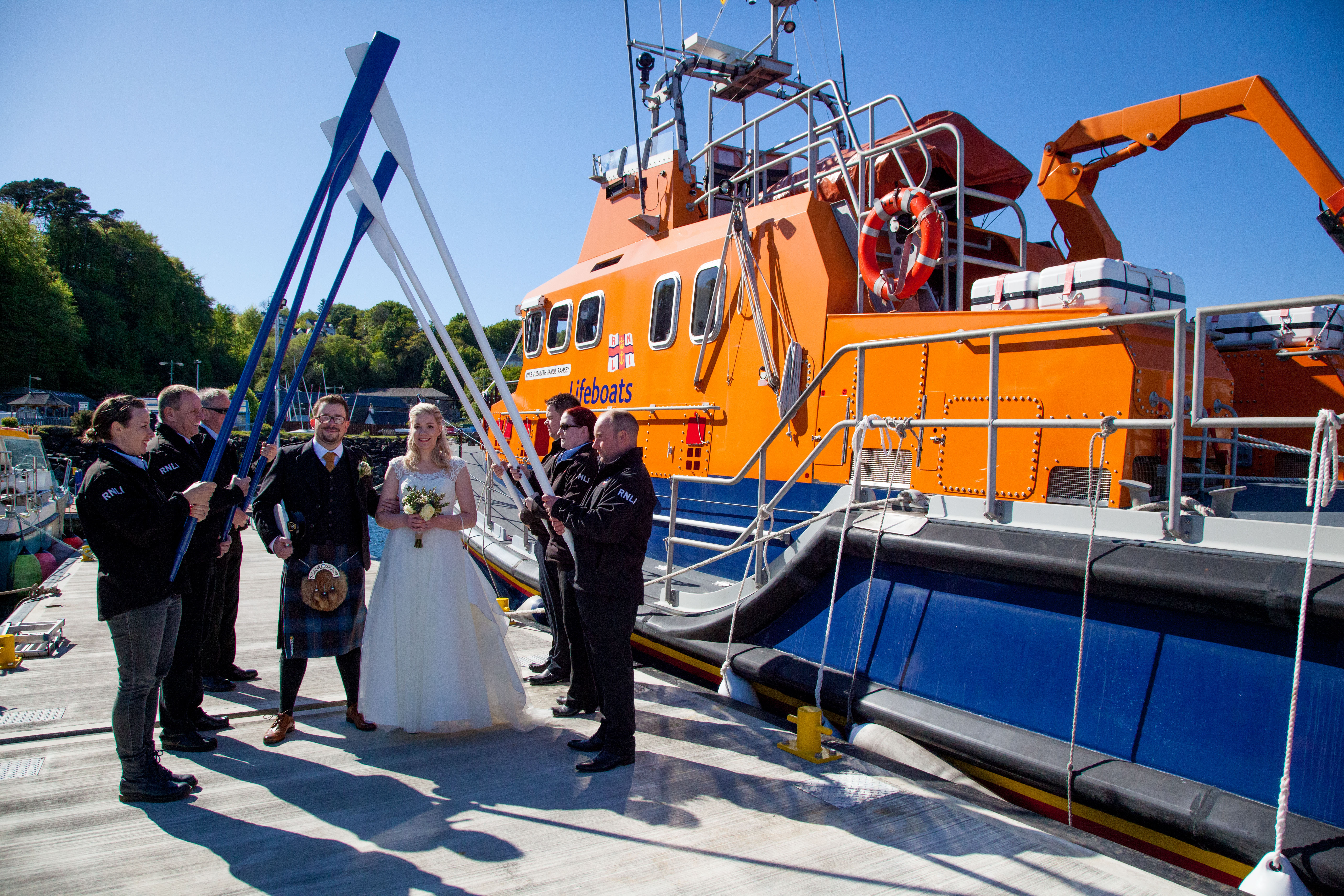 Tobermory lifeboat crew guard of honour for Coxswain David and Seonaid