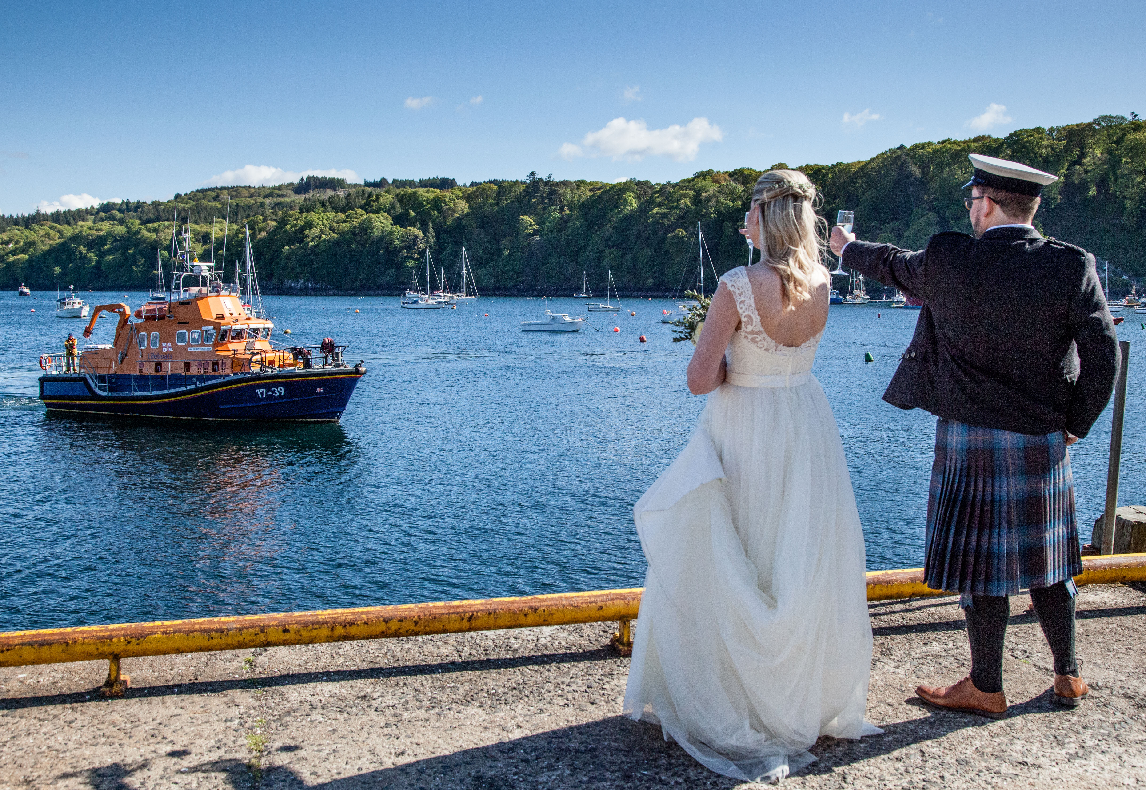 Seonaid and David toast the lifeboat