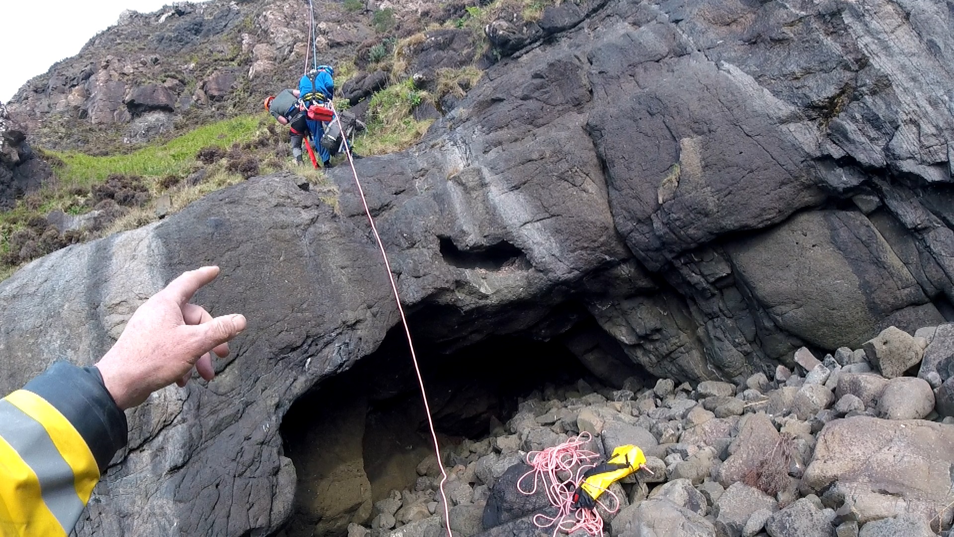 Tobermory Coastguard Rescue Officer descending with cragfast climber