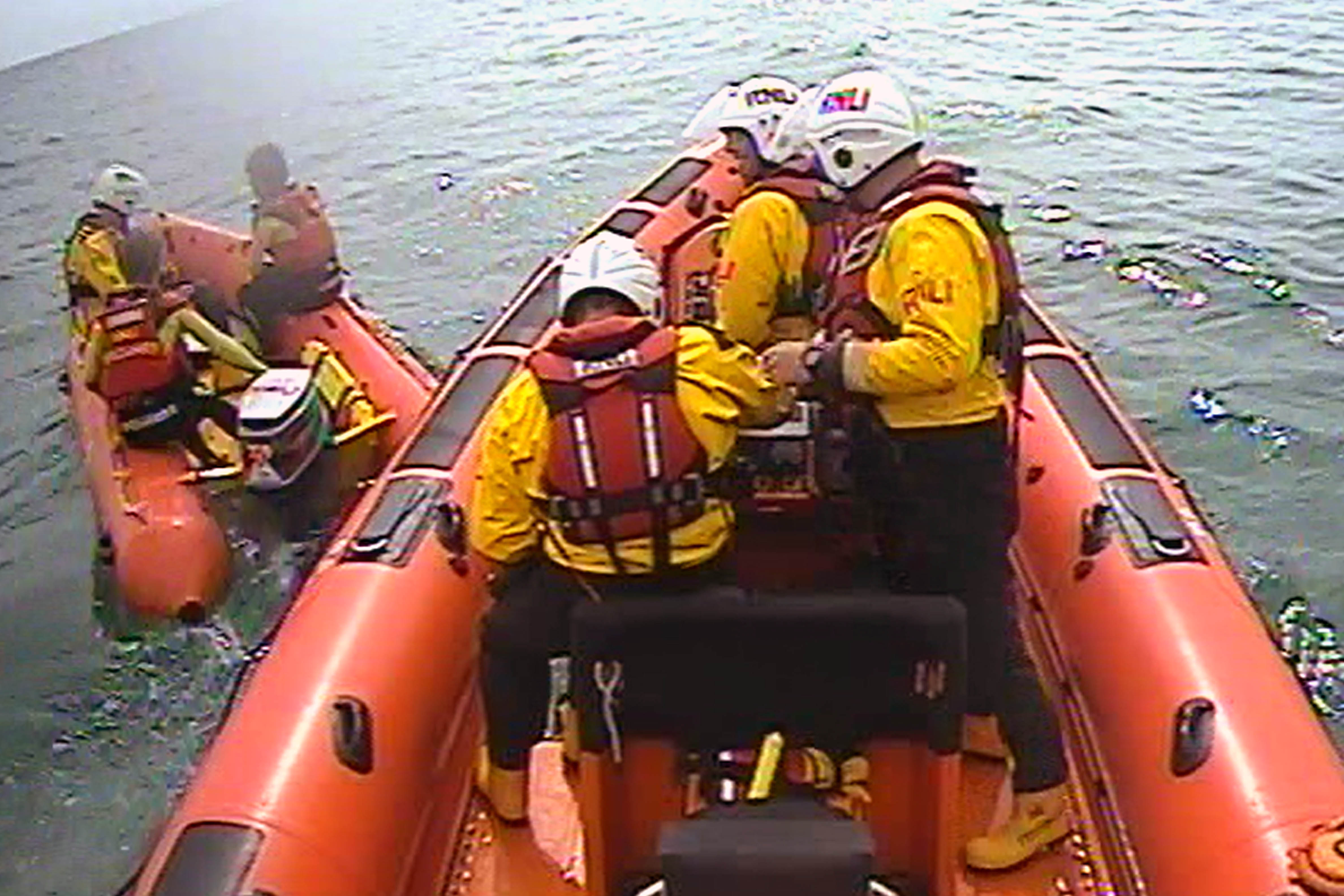 Video still - Looe RNLI Atlantic 85 Sheila and Dennis Tongue II with RNLI Sharrow Point lifeguards