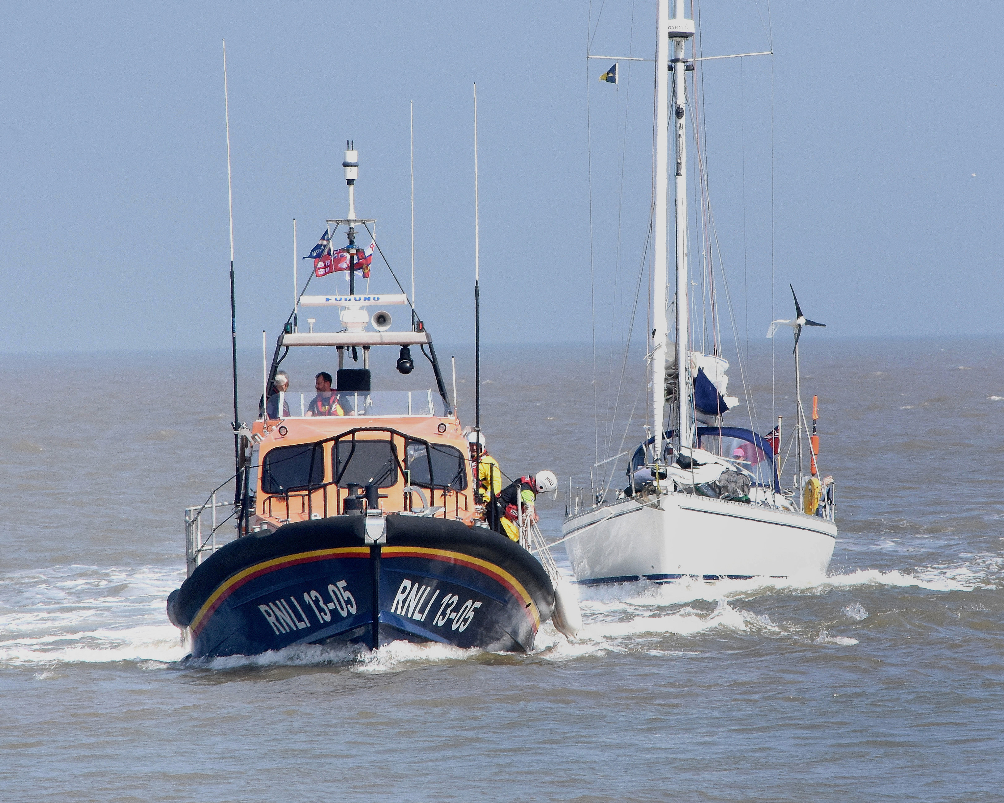 Lowestoft RNLI lifeboat tows the yacht with engine failure in port