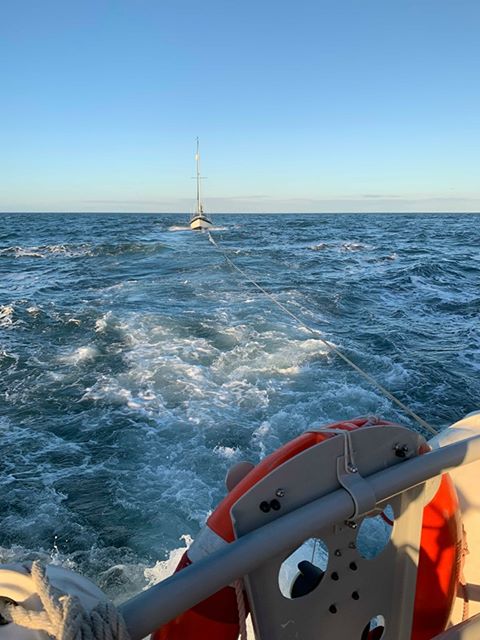 Yacht Sallie Forth under tow by Filey Lifeboat.