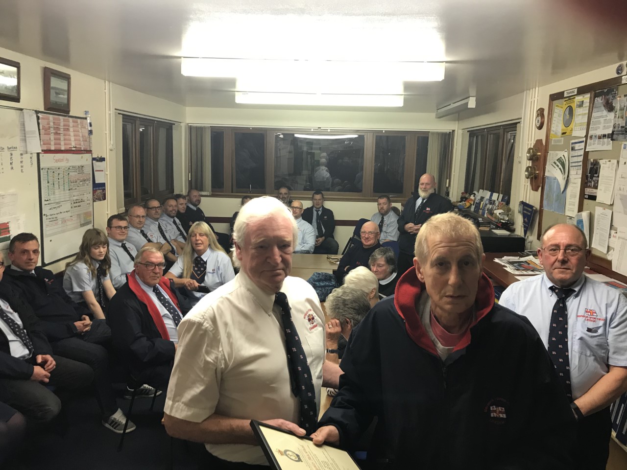 Shore Crew Douglas Blackhall 'Spider' receives award from President Ian Hay