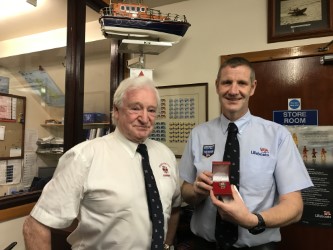 Helmsman Michael Avril recieves award from President Ian Hay