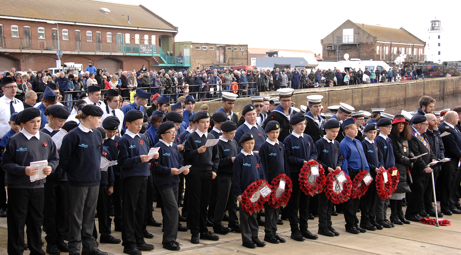 Veterans, standard bearers, wreath-carriers, coastguards and army, air and sea cadets