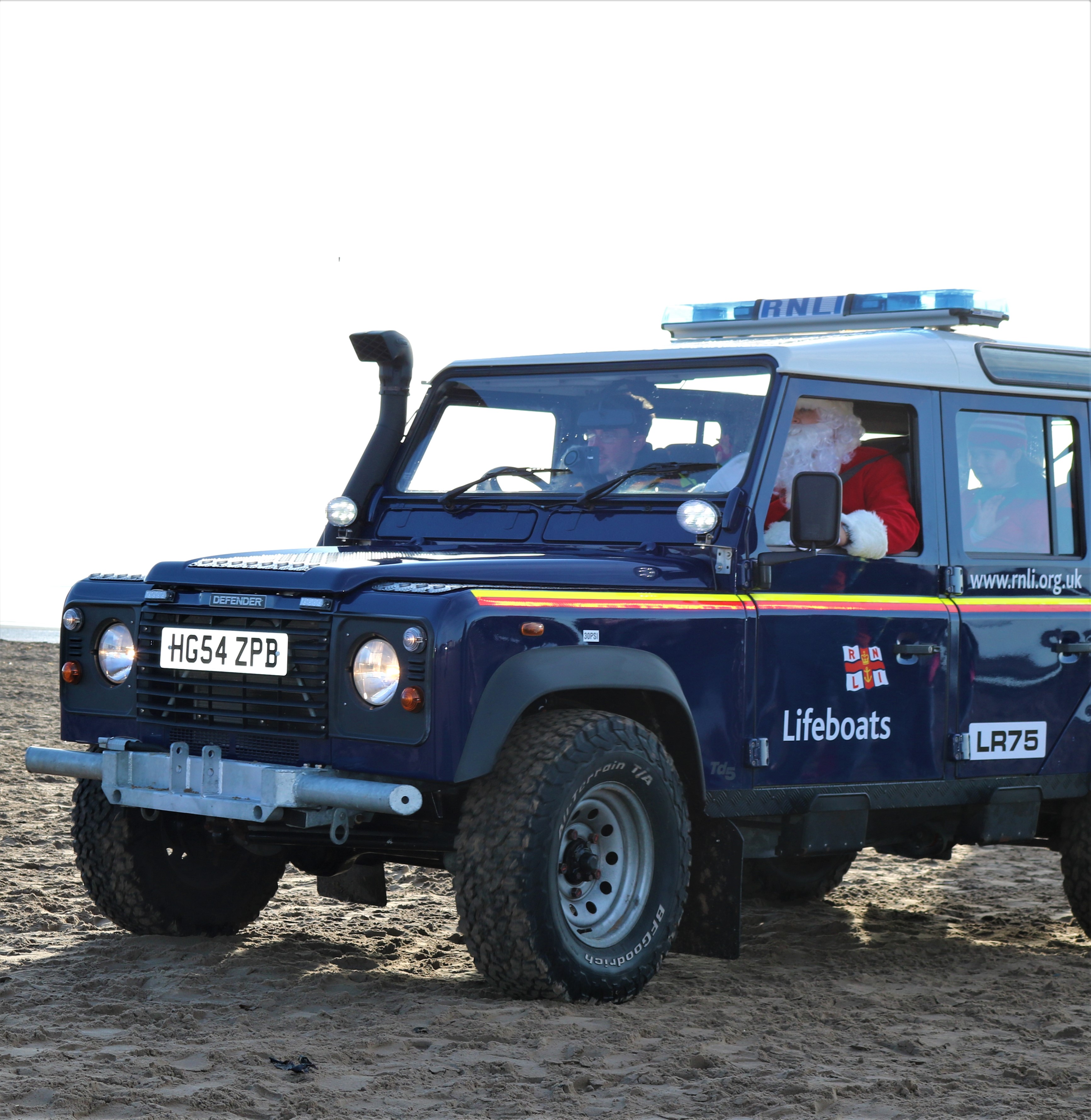 Santa aboard the station RNLI Land Rover