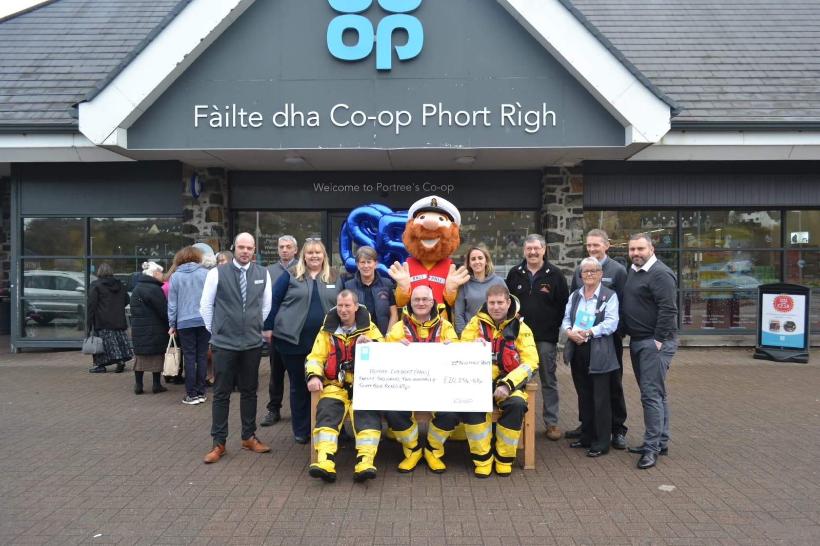 Portree Lifeboat crew, fundraisers &amp; Staff outside Portree Cooperative