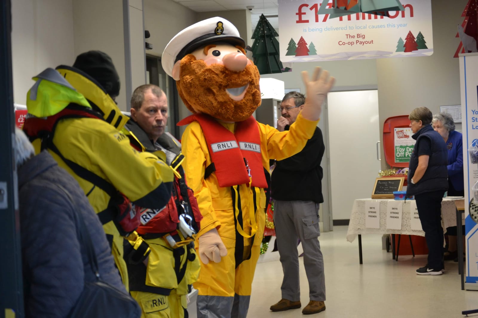 Stormy Stan in the foyer of the Portree Cooperative greeting customers