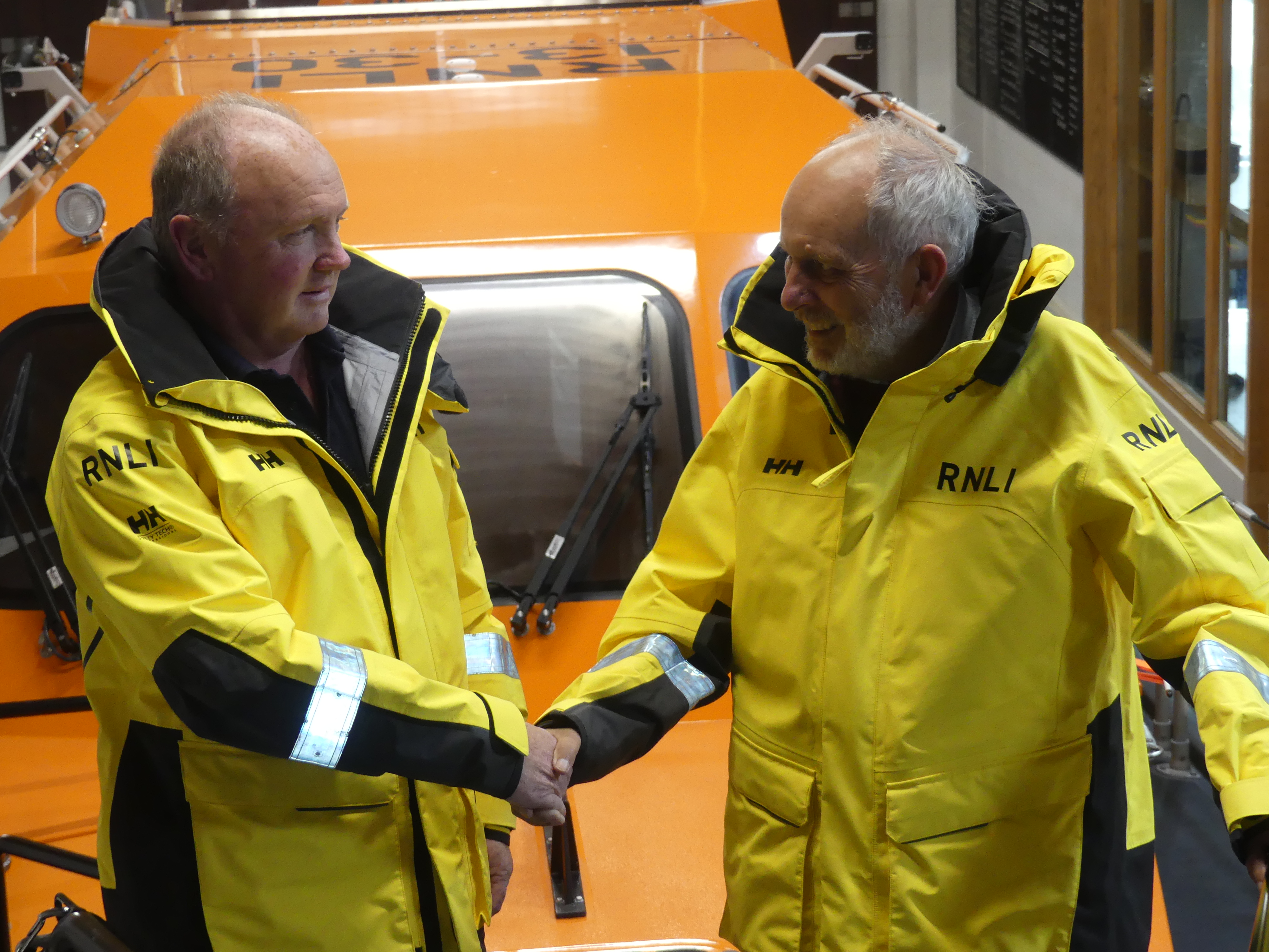 (L) Incoming LOM Mark James and retiring LOM (R) David Bailey aboard ALB Ella Larsen