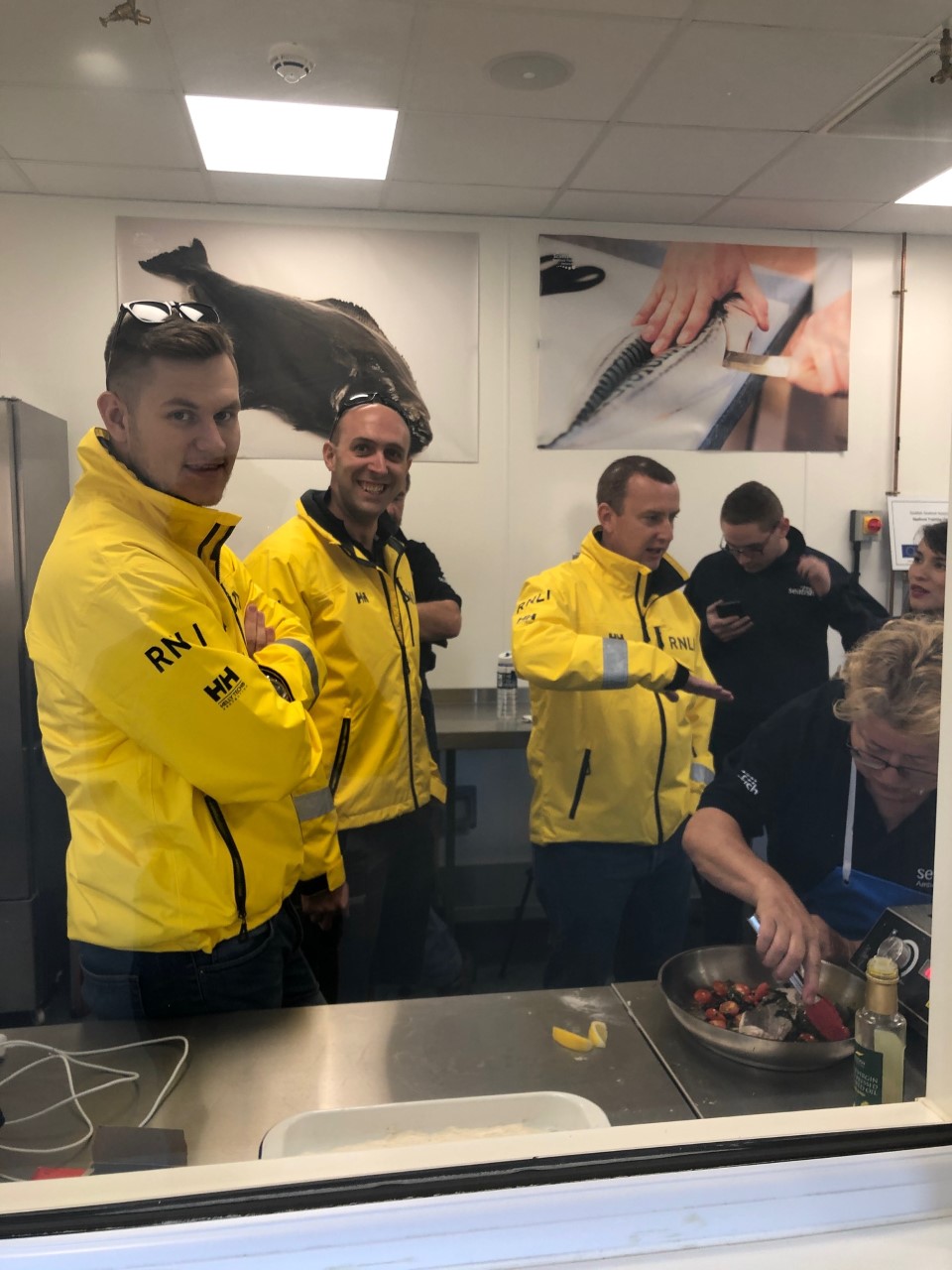 The crew watching on as another fresh fish dish is prepared