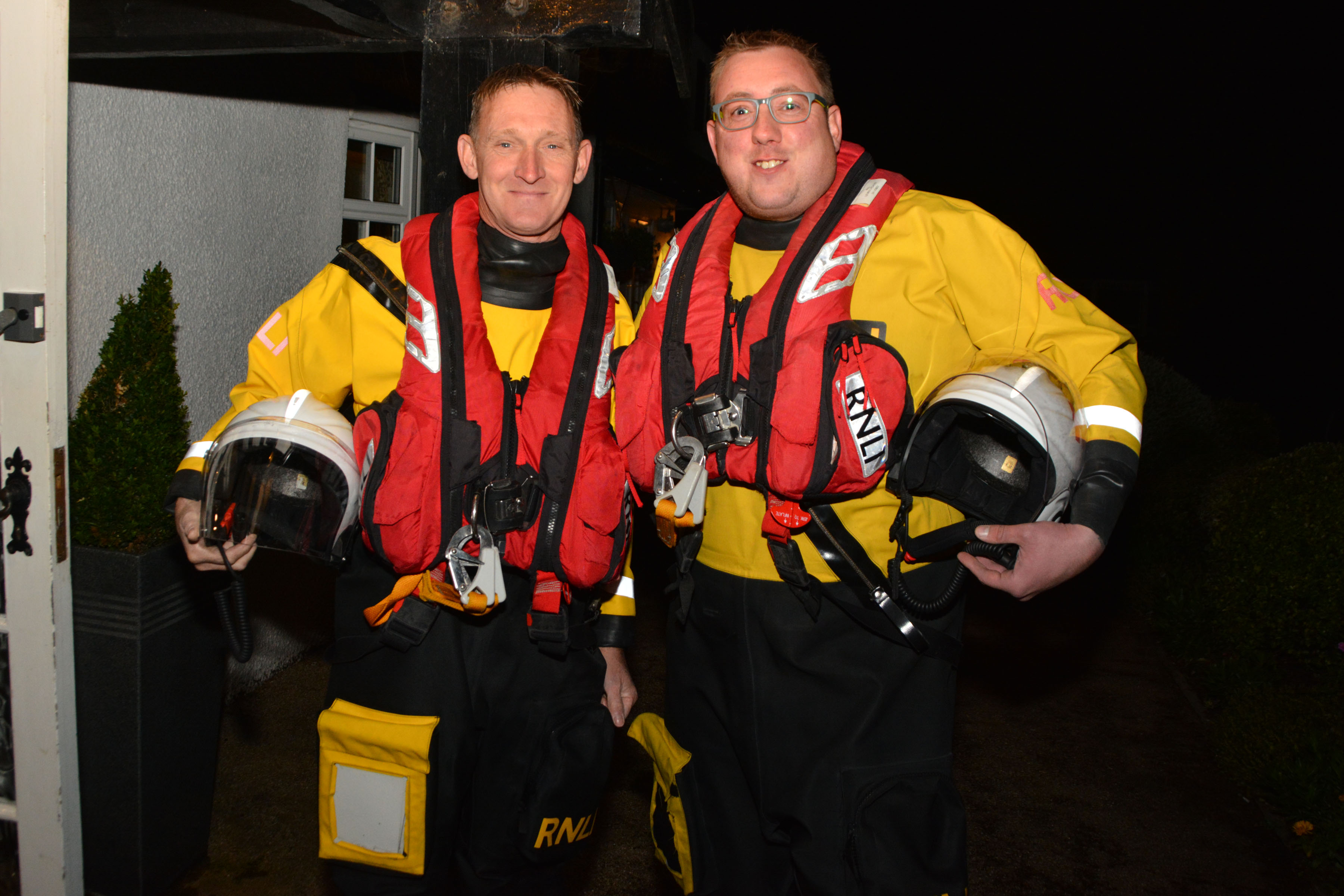 Helmsmen Nick and Marc greeting the balls guests at the door