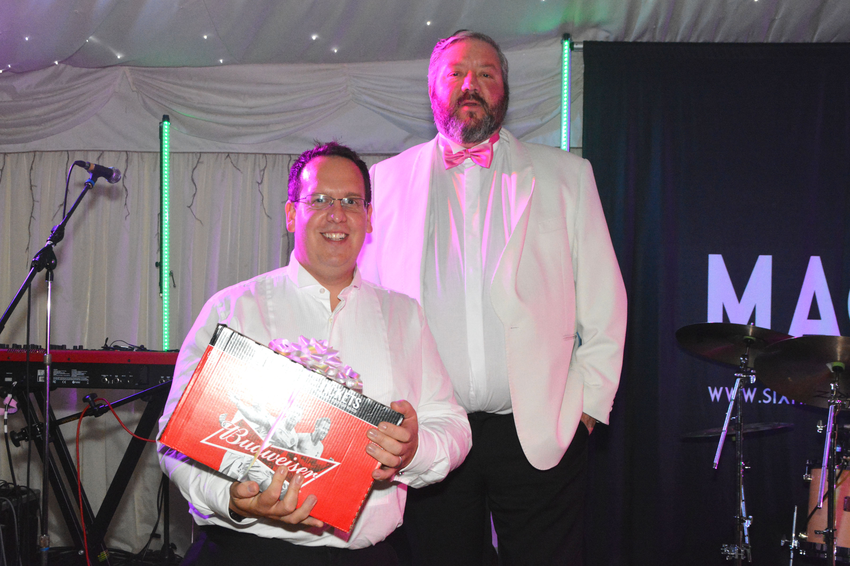 Lead organiser Tim Walters accepts a gift from Operations Manager Matt Davies