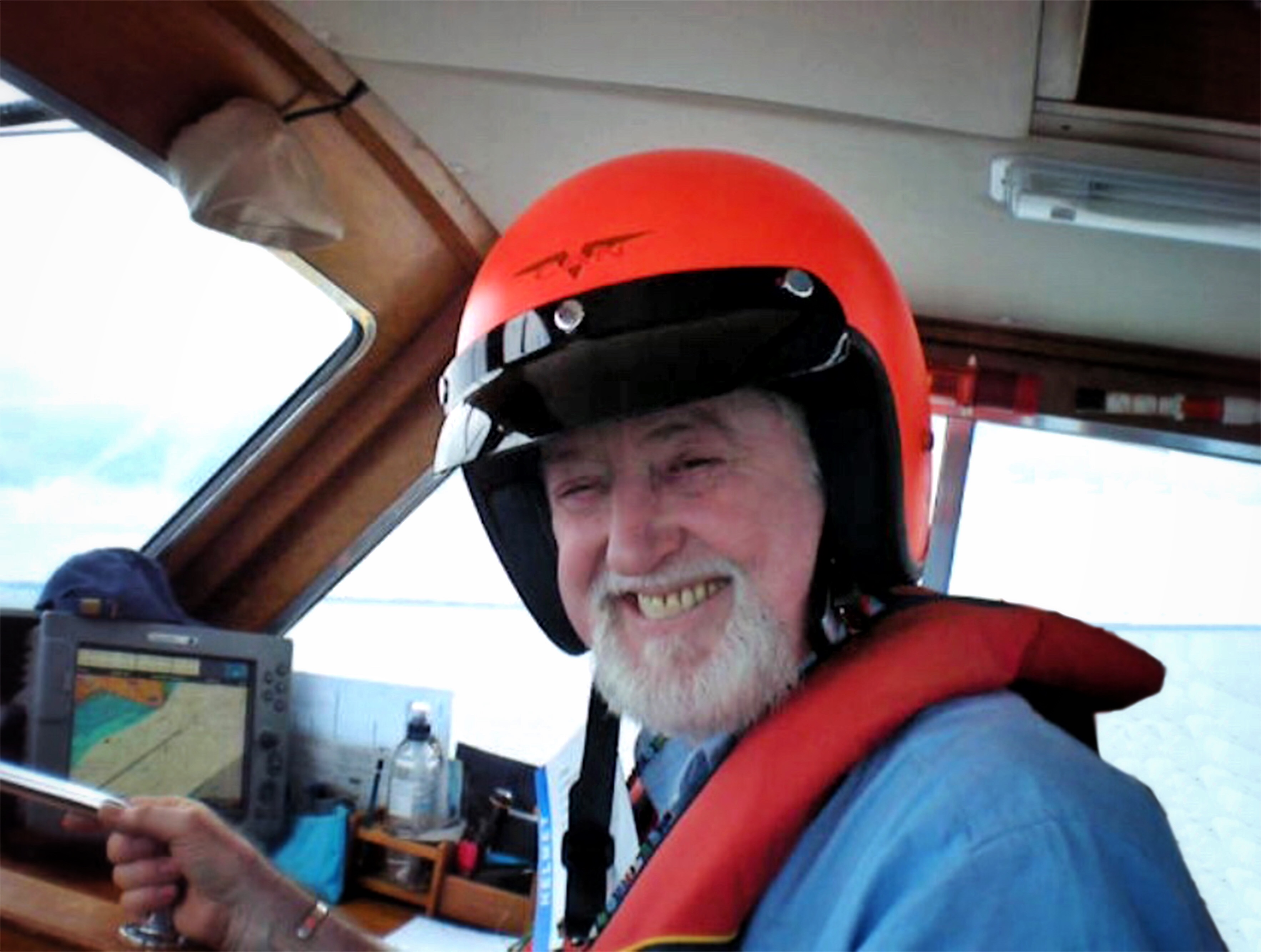 Michael Barlow at the helm of Ocean Pirate 