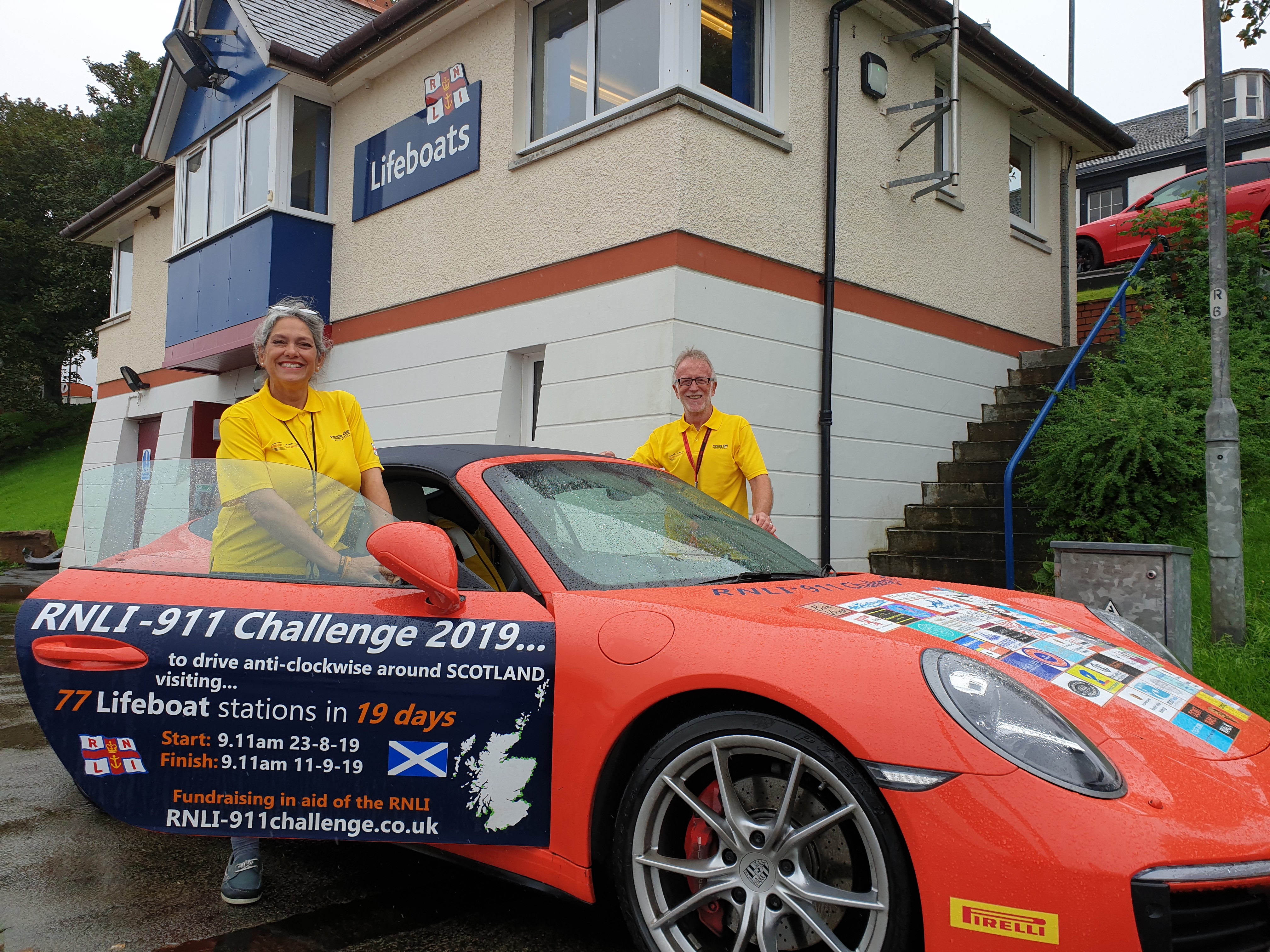 Belinda and James with their Porsche 911 at Girvan Lifeboat station.